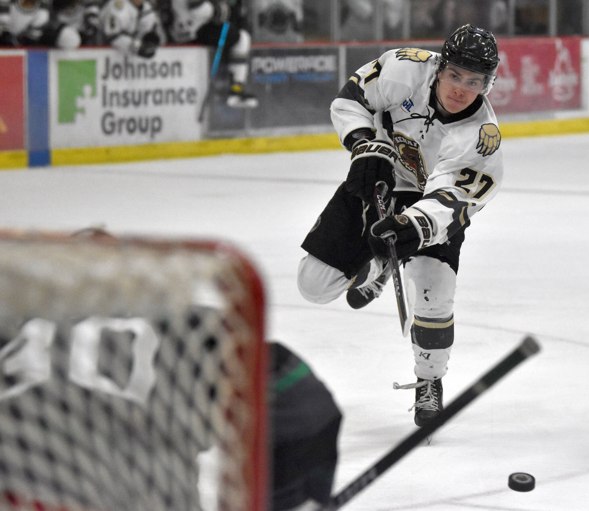 Minnesota Wilderness goaltender Isak Posch saves a breakaway by Kenai River Brown Bears forward Garett Drotts on Friday, April 28, 2023, at the Soldotna Regional Sports Complex in Soldotna, Alaska. (Photo by Jeff Helminiak)