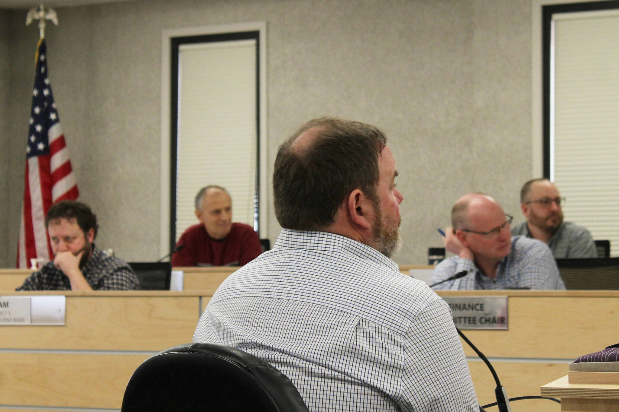 Kenai Peninsula Borough School District Superintendent Clayton Holland, center, addresses the Kenai Peninsula Borough Assembly during a budget work session on Tuesday, March 14, 2023 in Soldotna, Alaska. (Ashlyn O’Hara/Peninsula Clarion)