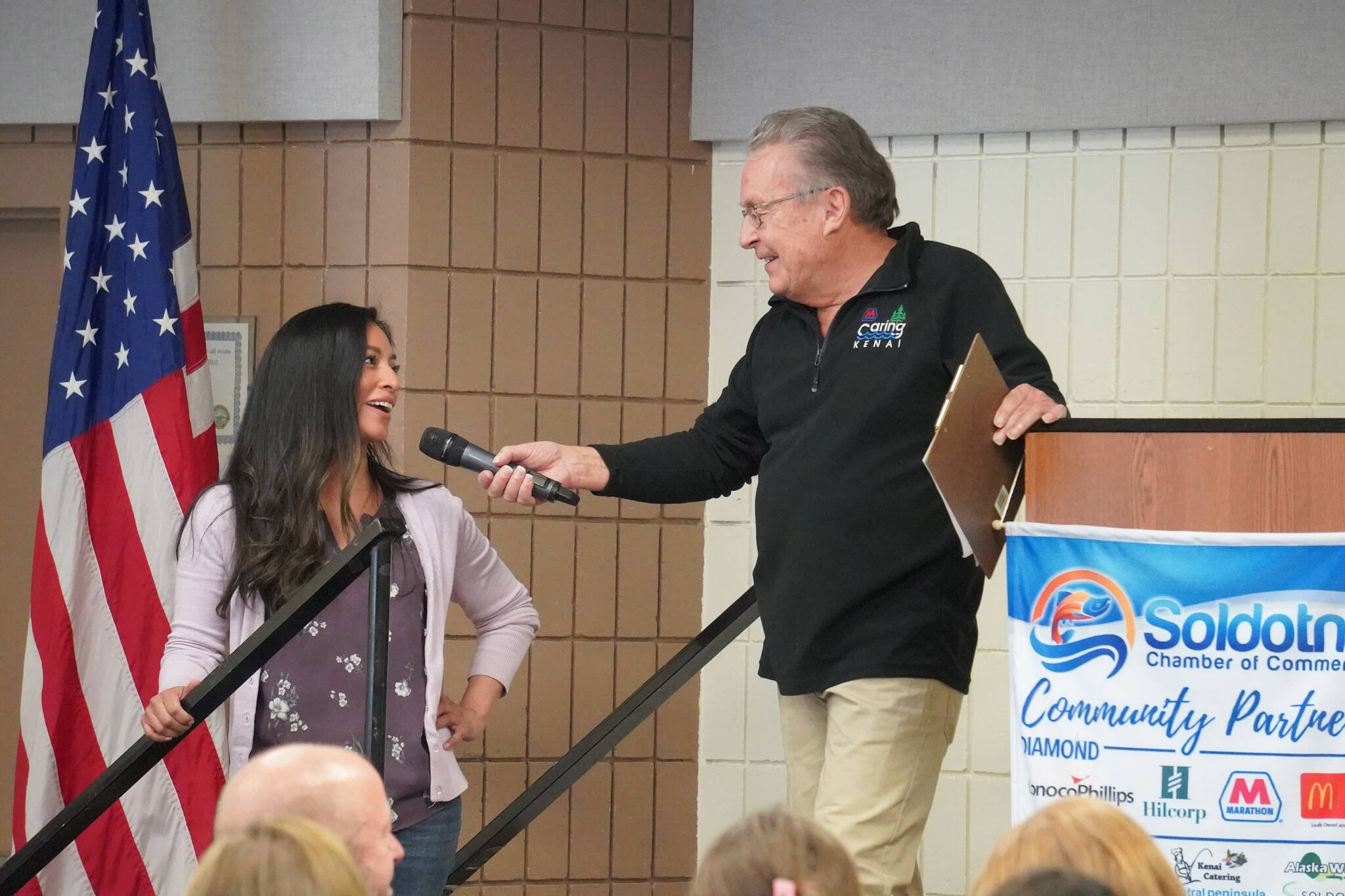 Hadassah Knight is introduced by Merrill Sikorski at the Caring for the Kenai Awards Celebration held during a Joint Chamber Luncheon on Wednesday, May 3, 2023, at the Soldotna Regional Sports Complex in Soldotna, Alaska. (Jake Dye/Peninsula Clarion)