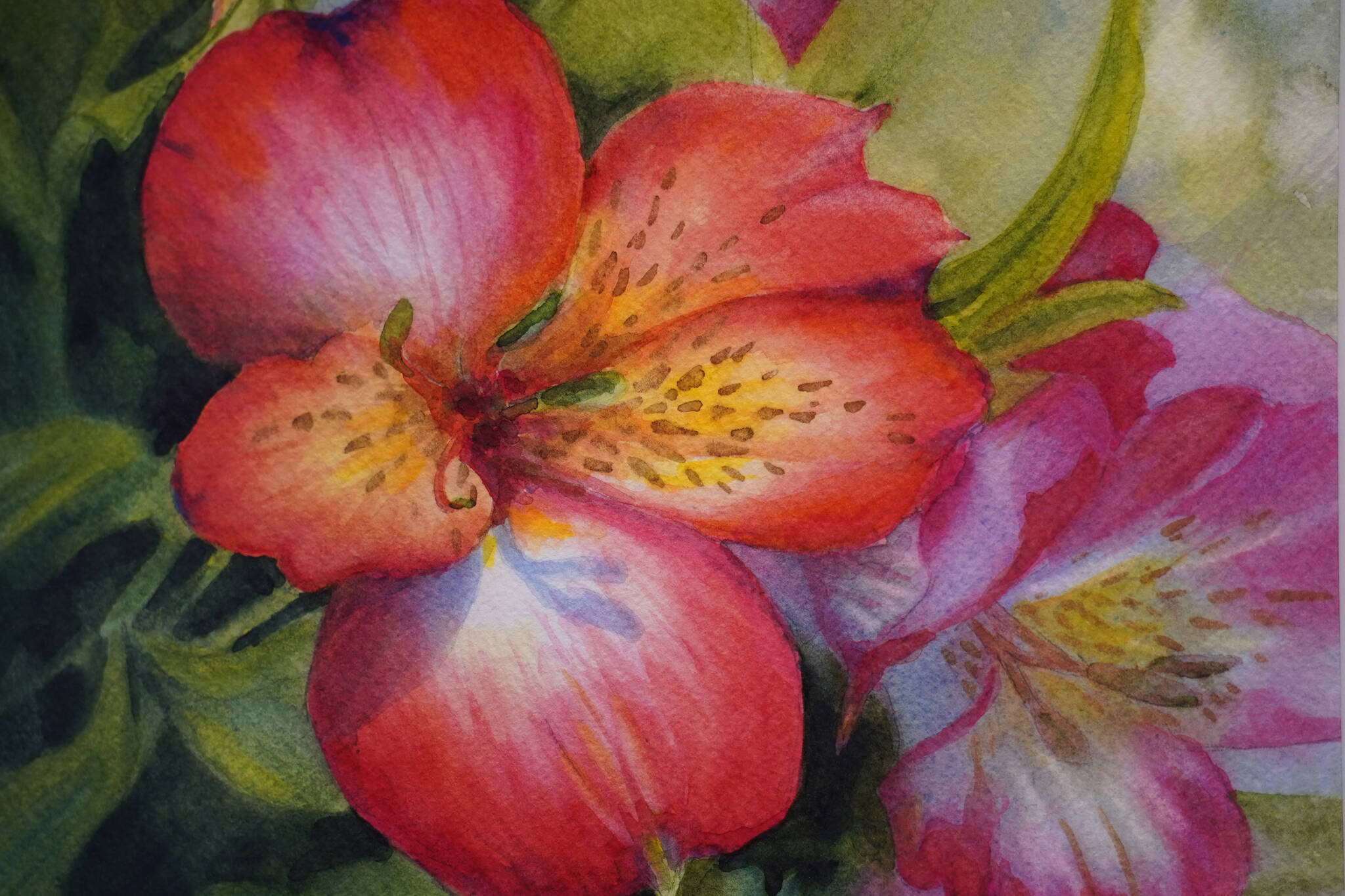 ”Alstroemeria,” by Melinda Hershberger, hangs as part of “Thursday Art Group” at the Kenai Art Center in Kenai, Alaska, on Wednesday, May 3, 2023. (Jake Dye/Peninsula Clarion)