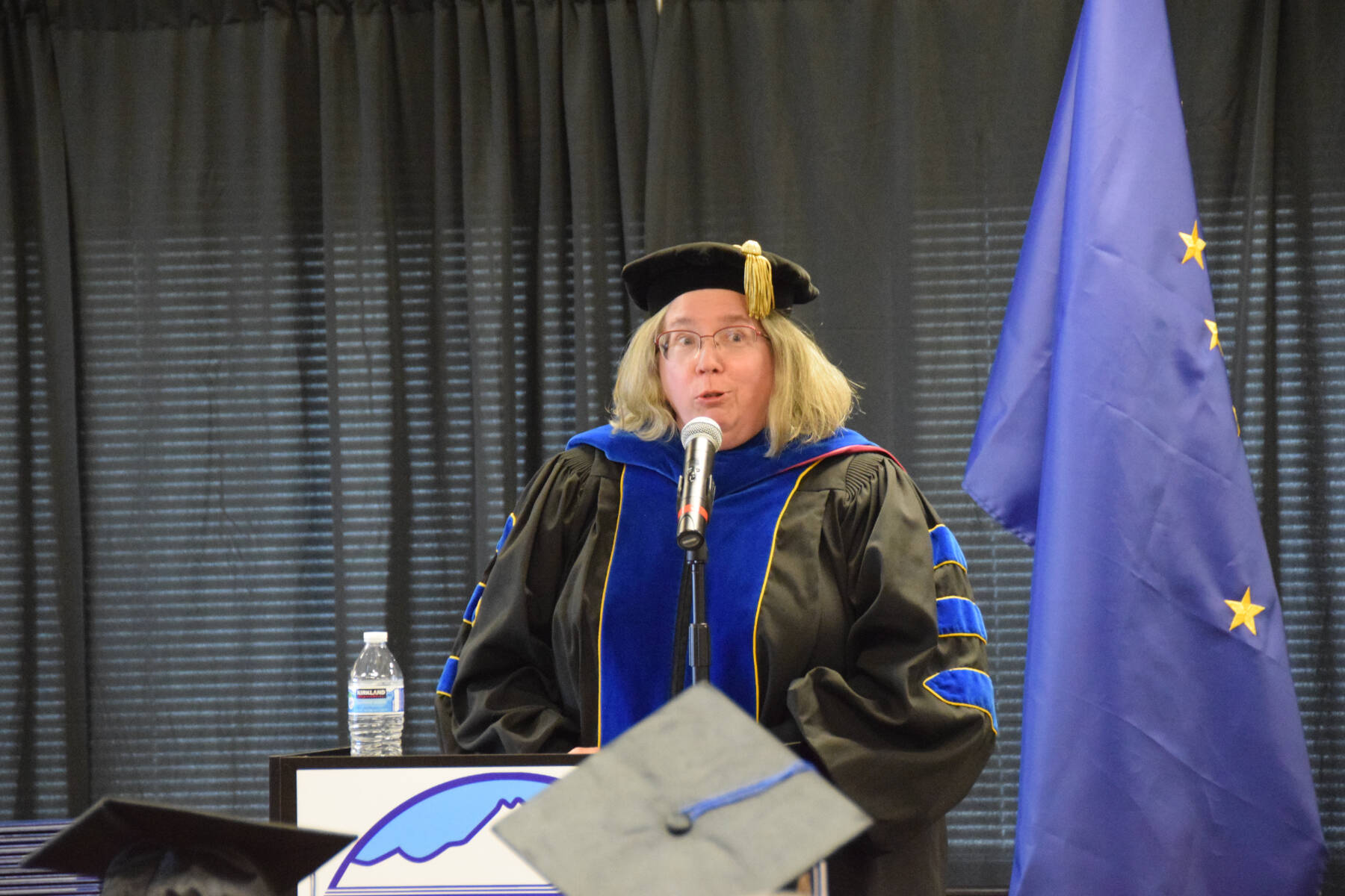 Keynote speaker Dr. Paula Martin addresses the graduates at the 2023 Kachemak Bay Campus commencement on Wednesday, May 10, 2023, in Homer, Alaska. (Photo by Delcenia Cosman/Homer News)
