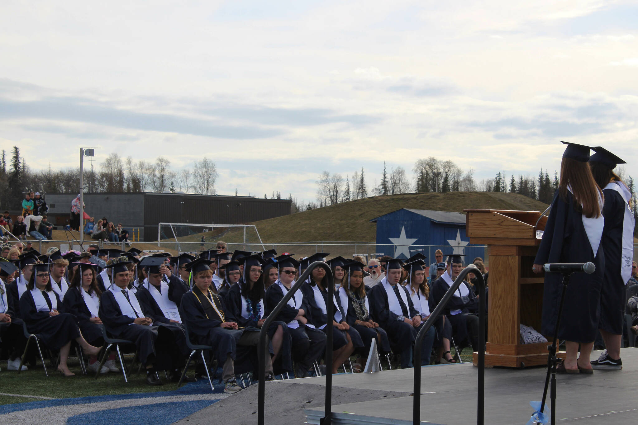 Soldotna High School Salutatorian Molly McMillan and Valedictorian JulieAnn Nye address students during a graduation ceremony on Monday, May 15, 2023, in Soldotna, Alaska. (Ashlyn O’Hara/Peninsula Clarion)