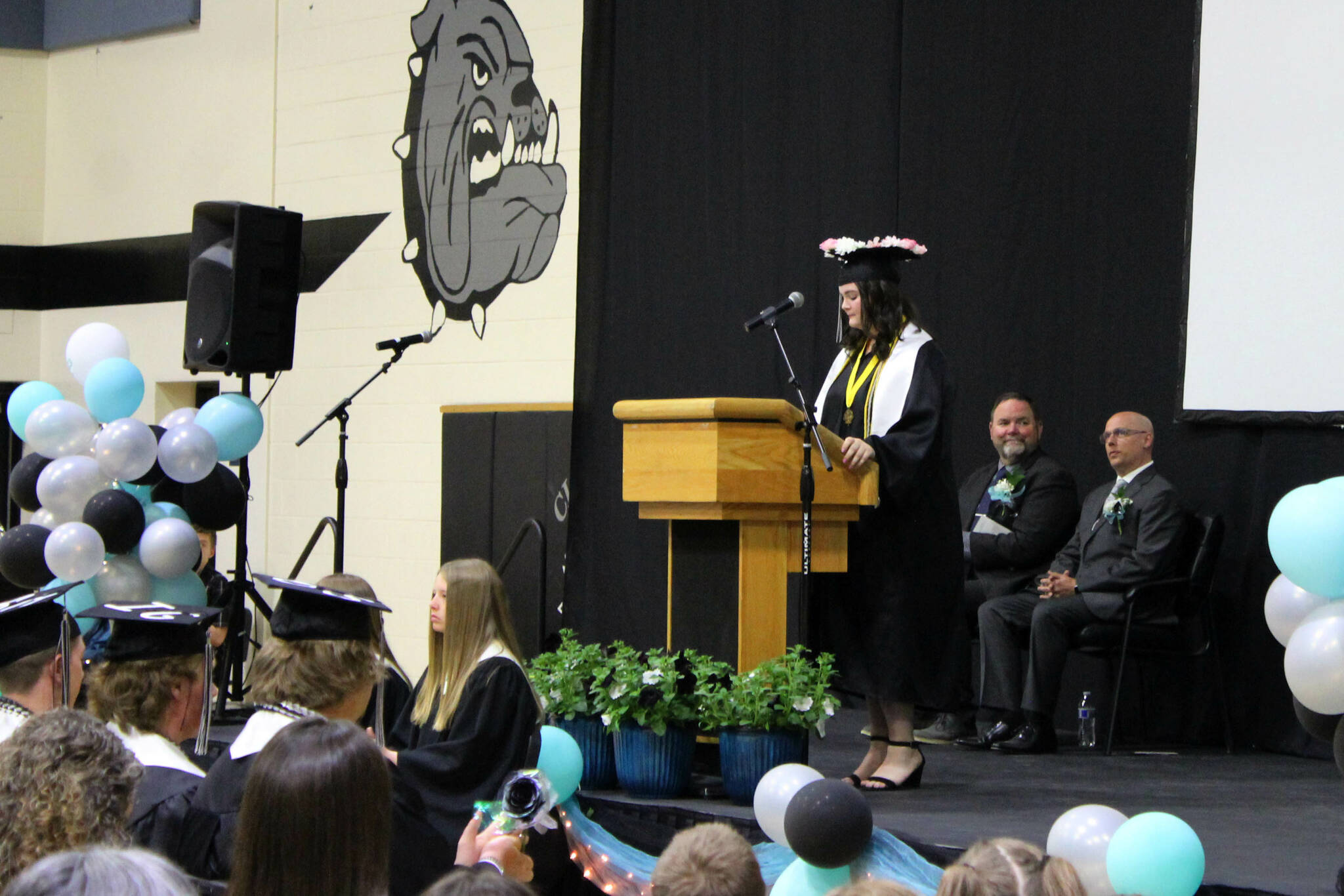 Nikiski Middle/High School graduate Jessica Perry delivers a valedictorian address during a ceremony on Tuesday, May 16, 2023, in Nikiski, Alaska. (Ashlyn O’Hara/Peninsula Clarion)