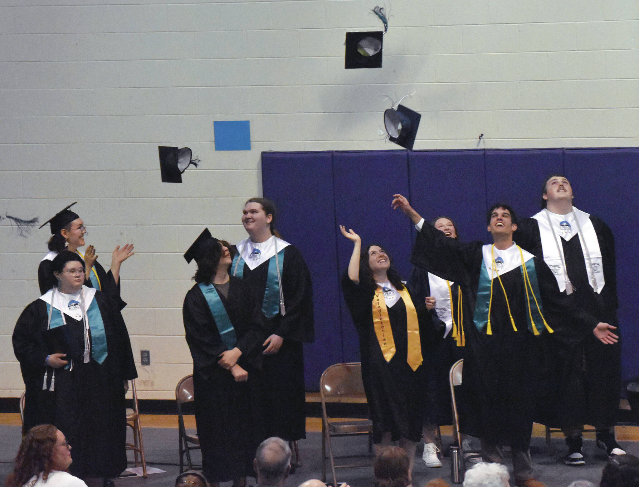 River City Academy graduates celebrate Wednesday at River City Academy inside Skyview Middle School just outside of Soldotna. (Photo by Jeff Helminiak/Peninsula Clarion)