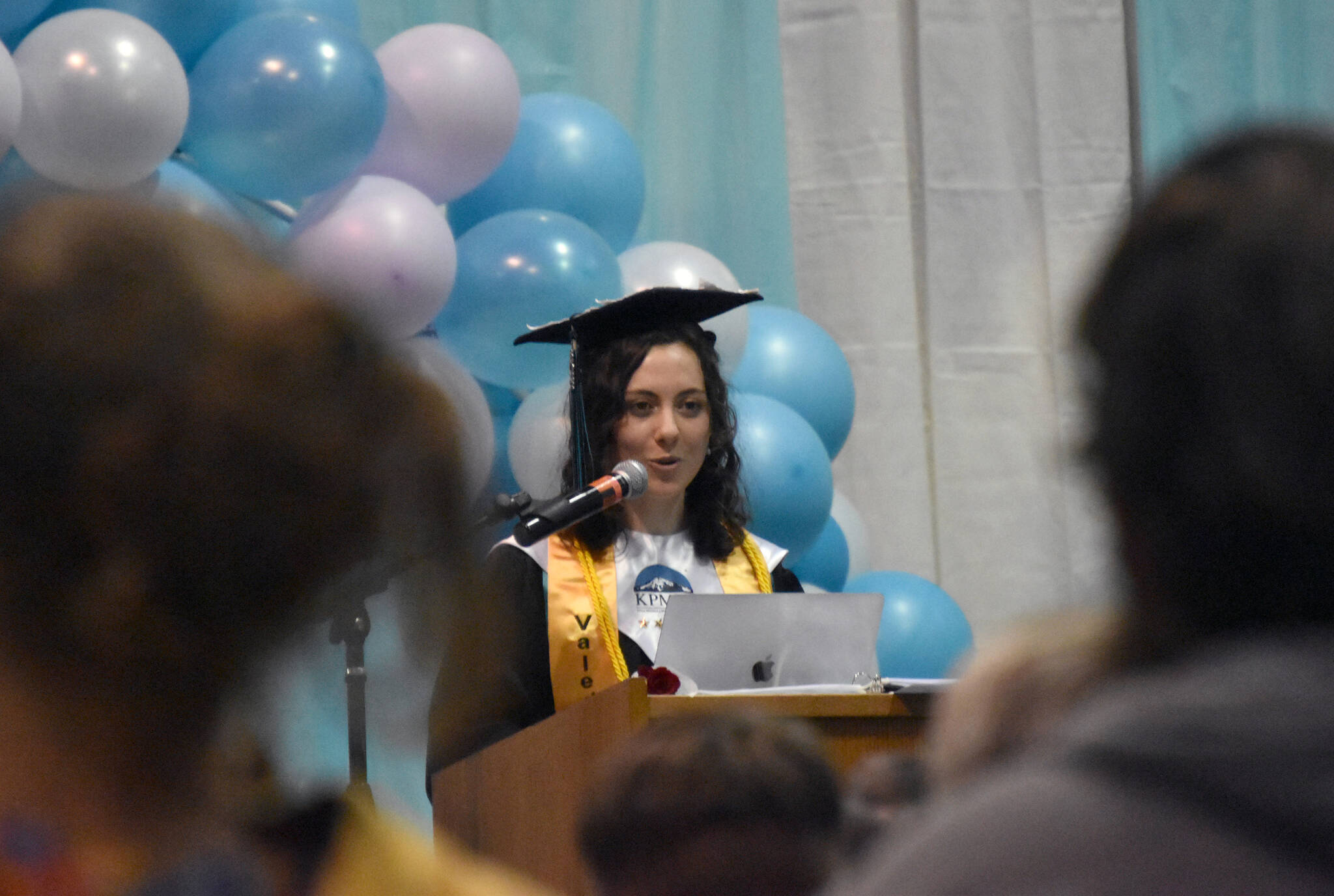 Valedictorian Elizabeth Rozeboom gives an address at the River City Academy graduation Wednesday, May 17, 2023, at River City Academy inside Skyview Middle School just outside of Soldotna, Alaska. (Photo by Jeff Helminiak/Peninsula Clarion)