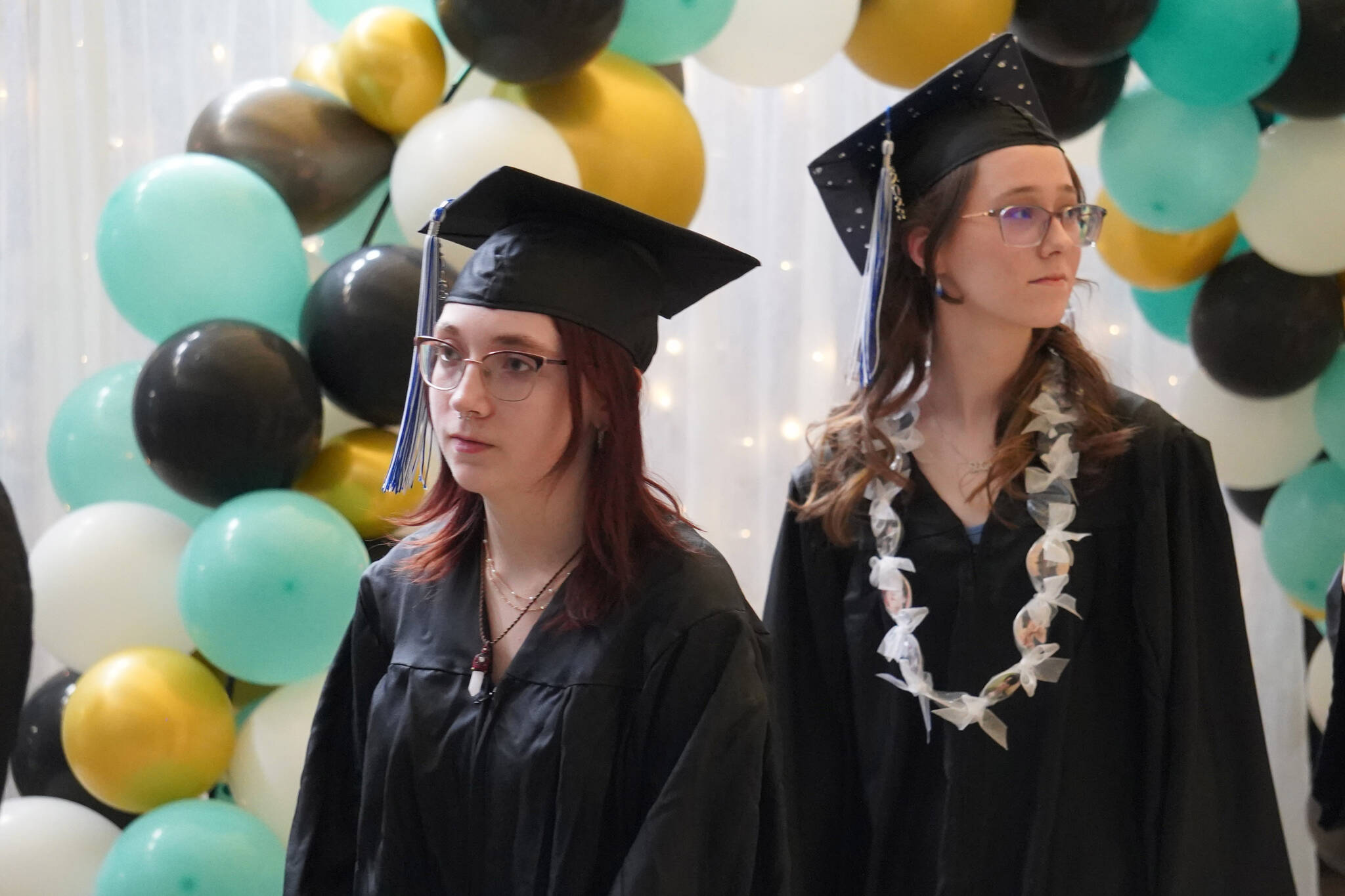 Connections Homeschool students prepare to enter the auditorium ahead of the Connections Homeschool graduation ceremony on Thursday, May 18, 2023, at Soldotna High School in Soldotna, Alaska. (Jake Dye/Peninsula Clarion)