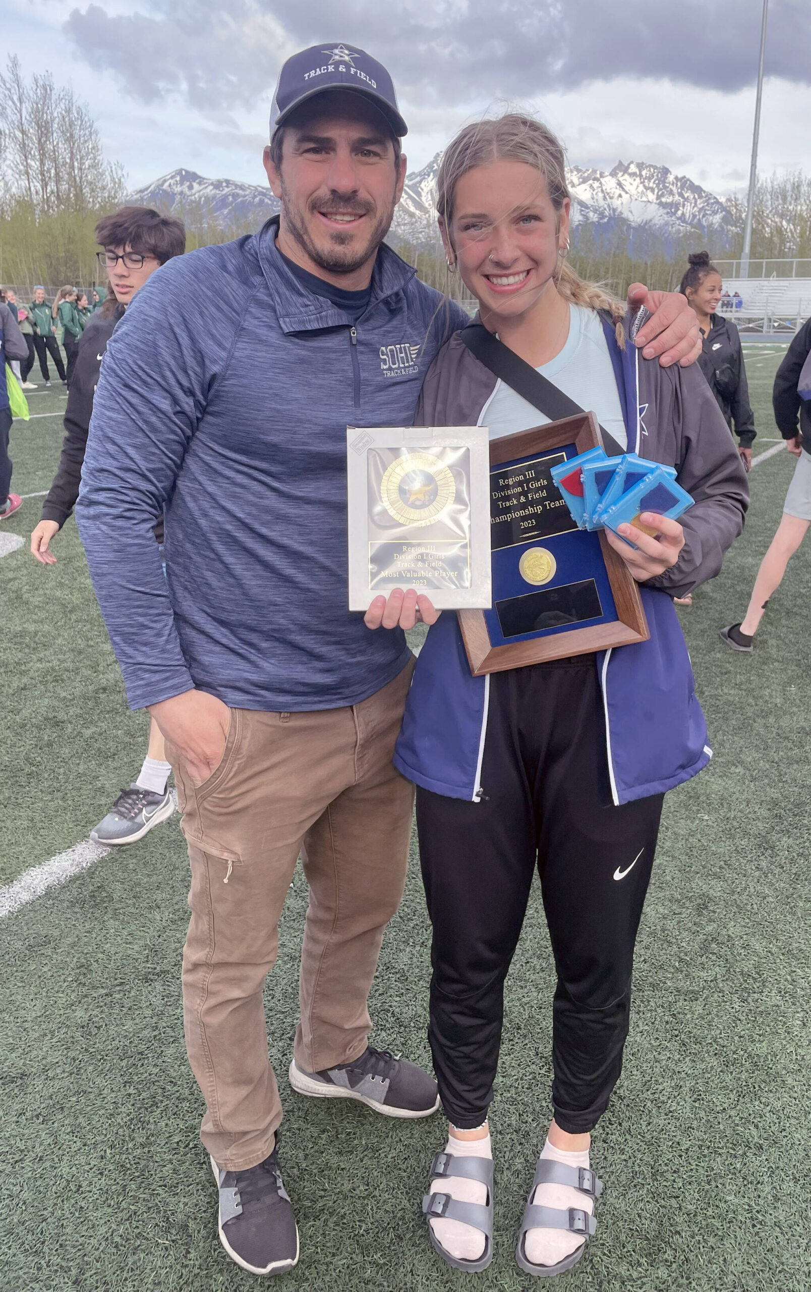 Phil Leck and Katelyn Morrison on Saturday, May 21, 2023, at the Region 3/Division I track and field meet at Palmer High School in Palmer, Alaska. Morrison was named the Region 3 athlete of the year. (Photo provided)