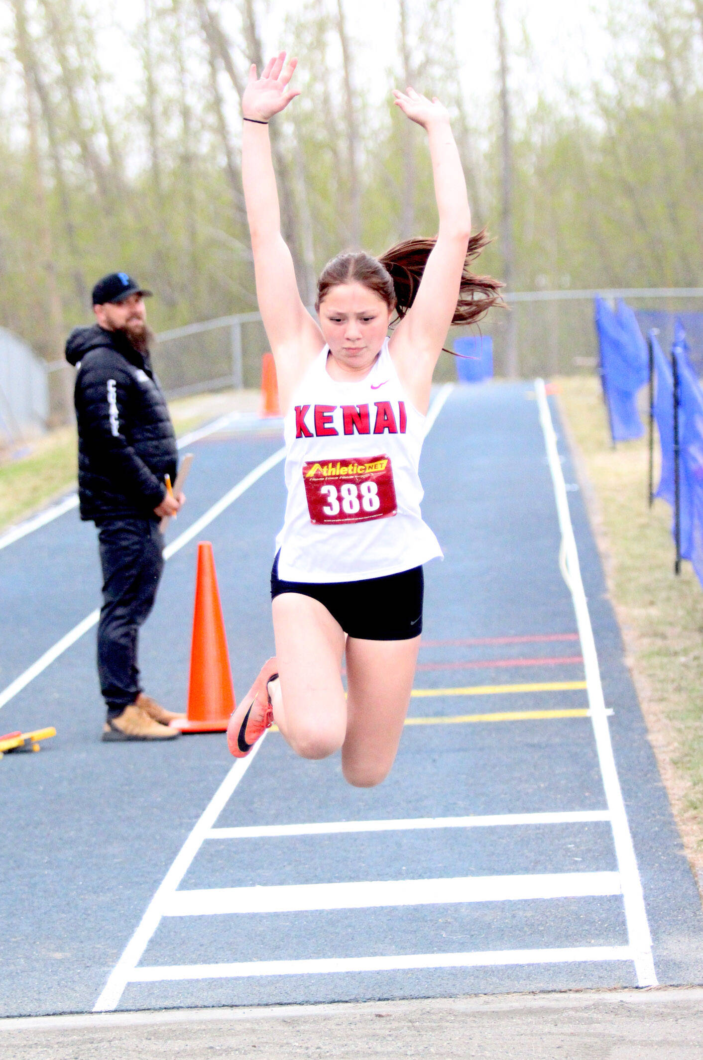 Kenai Central junior Emilee Wilson won the Division II triple jump with a leap of 31 feet, 2 3/4 inches, during the Region 3 track and field meet Friday, May 19, 2023, at Palmer High School in Palmer, Alaska. (Jeremiah Bartz/Frontiersman)