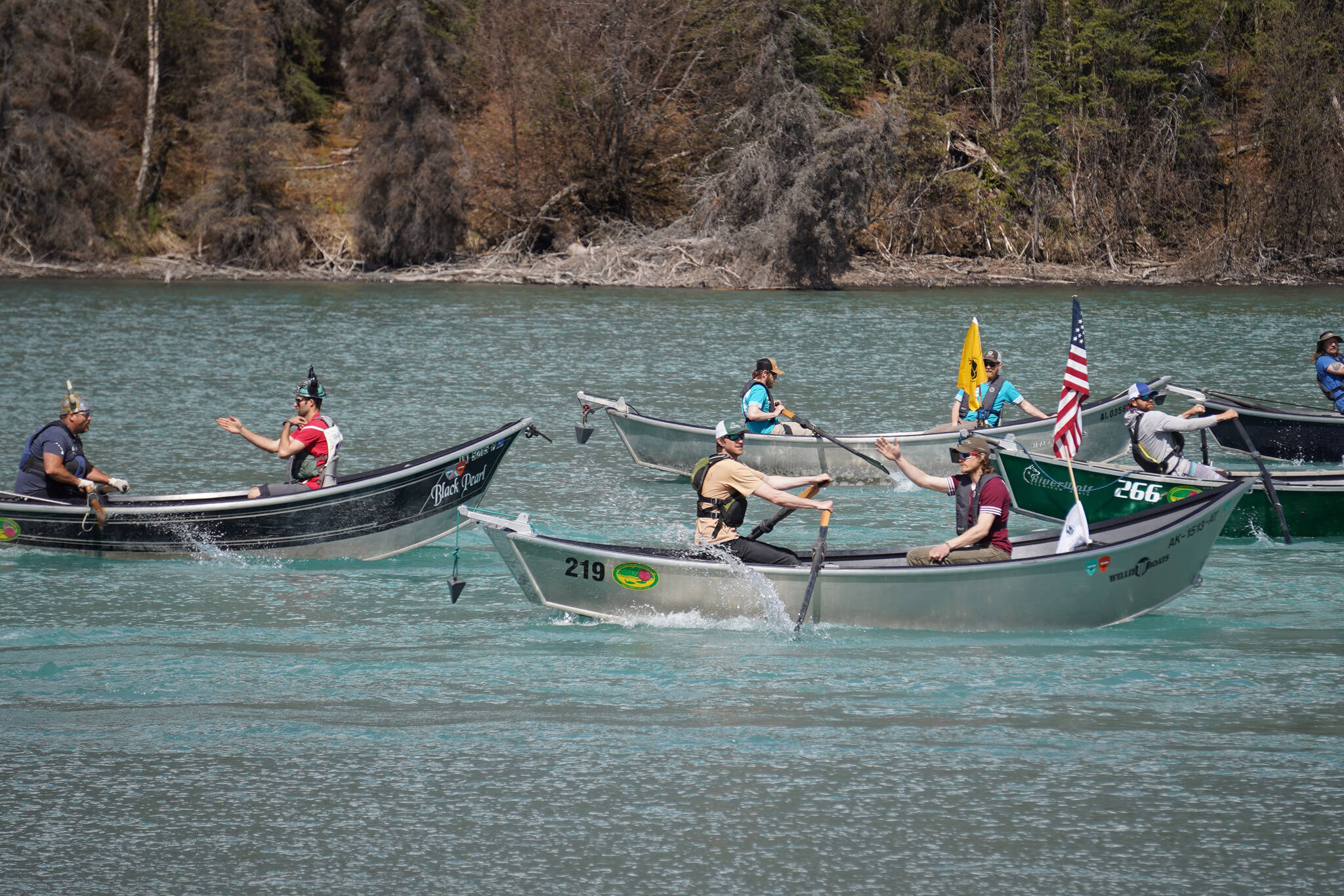 Contestants race down the Kenai River during the 16th Annual Cooper Landing Drift Boat Regatta near the Eagle Landing Resort in Cooper Landing, Alaska, on Saturday, May 20, 2023. (Jake Dye/Peninsula Clarion)