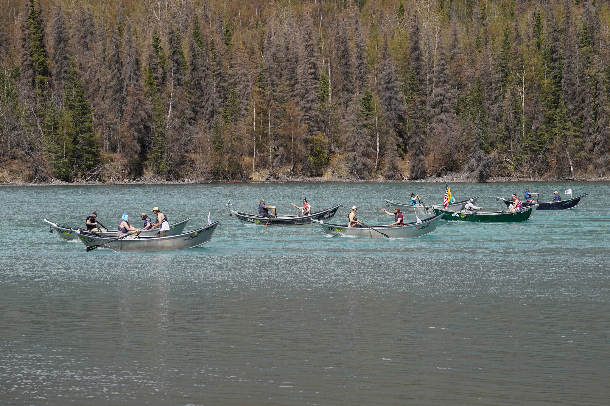Contestants race down the Kenai River during the 16th Annual Cooper Landing Drift Boat Regatta near the Eagle Landing Resort in Cooper Landing, Alaska, on Saturday, May 20, 2023. (Jake Dye/Peninsula Clarion)