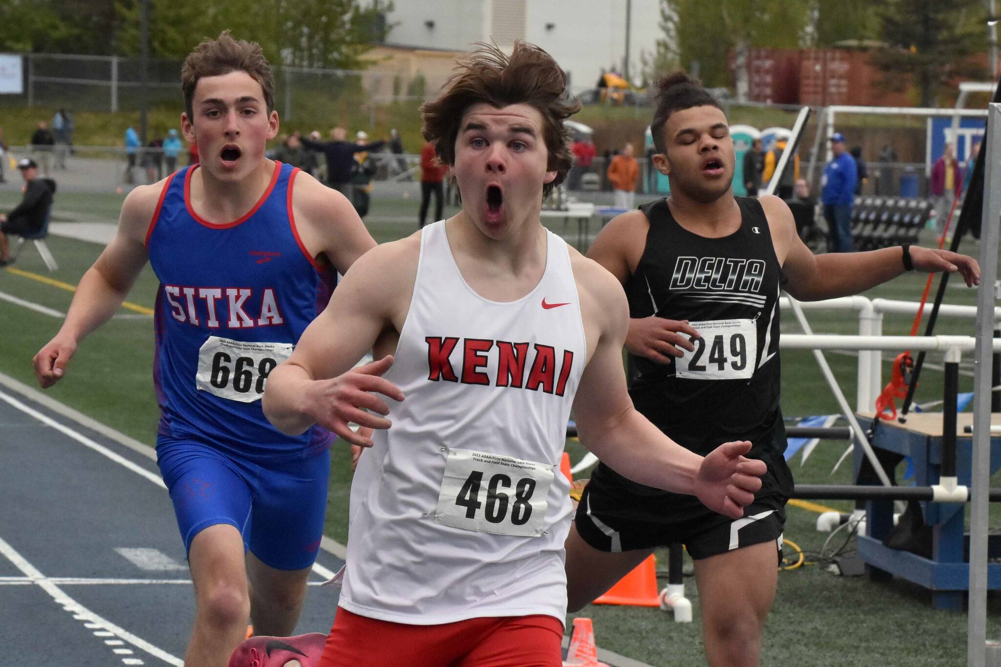 Kenai Central's Reagan Graves reacts after winning the Division II 200-meter dash Saturday, May 27, 2023, at the state track and field meet at Palmer High School in Palmer, Alaska. (Photo by Jeff Helminiak/Peninsula Clarion)