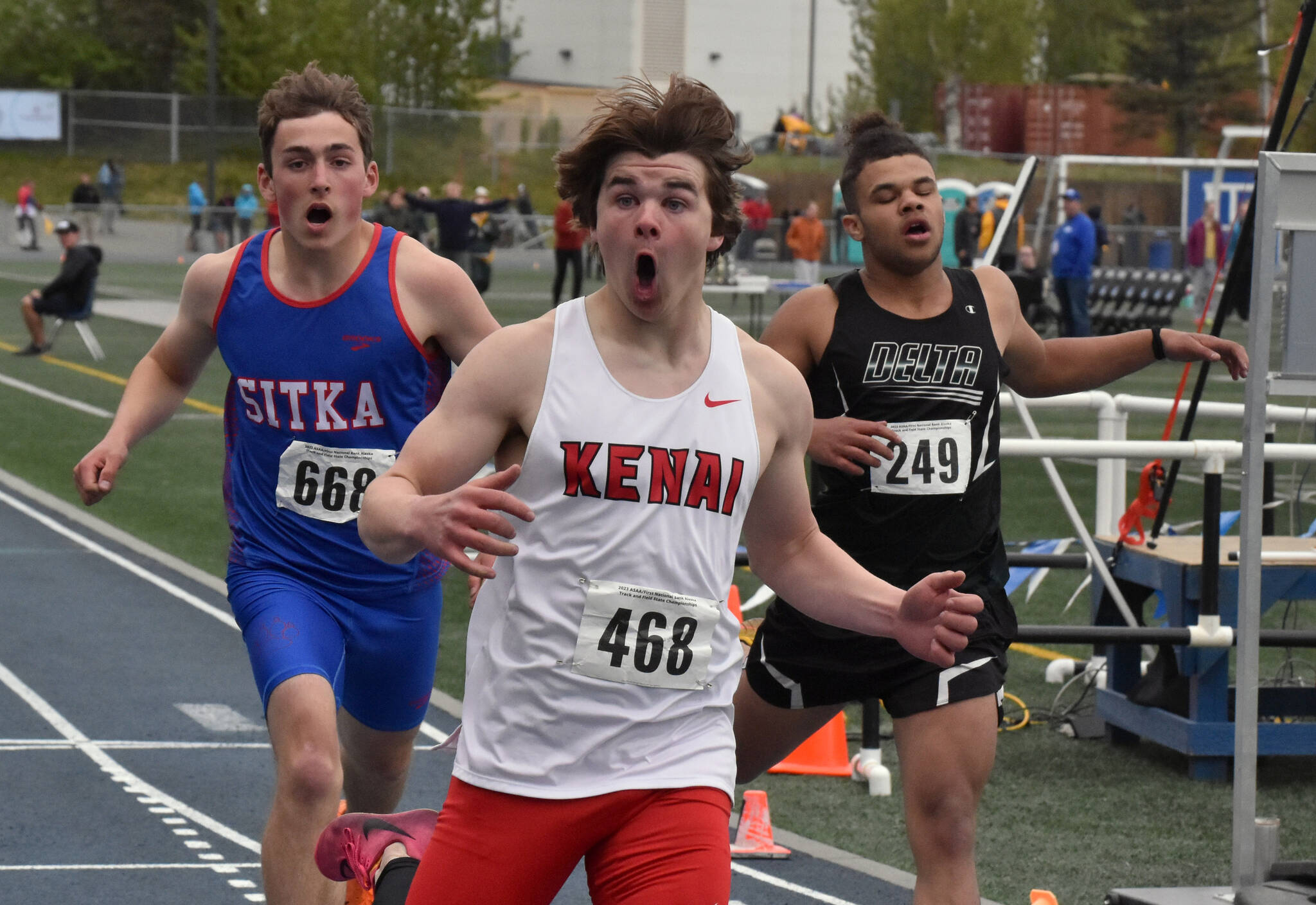 Kenai Central’s Reagan Graves reacts after winning the Division II 200-meter dash Saturday, May 27, 2023, at the state track and field meet at Palmer High School in Palmer, Alaska. (Photo by Jeff Helminiak/Peninsula Clarion)