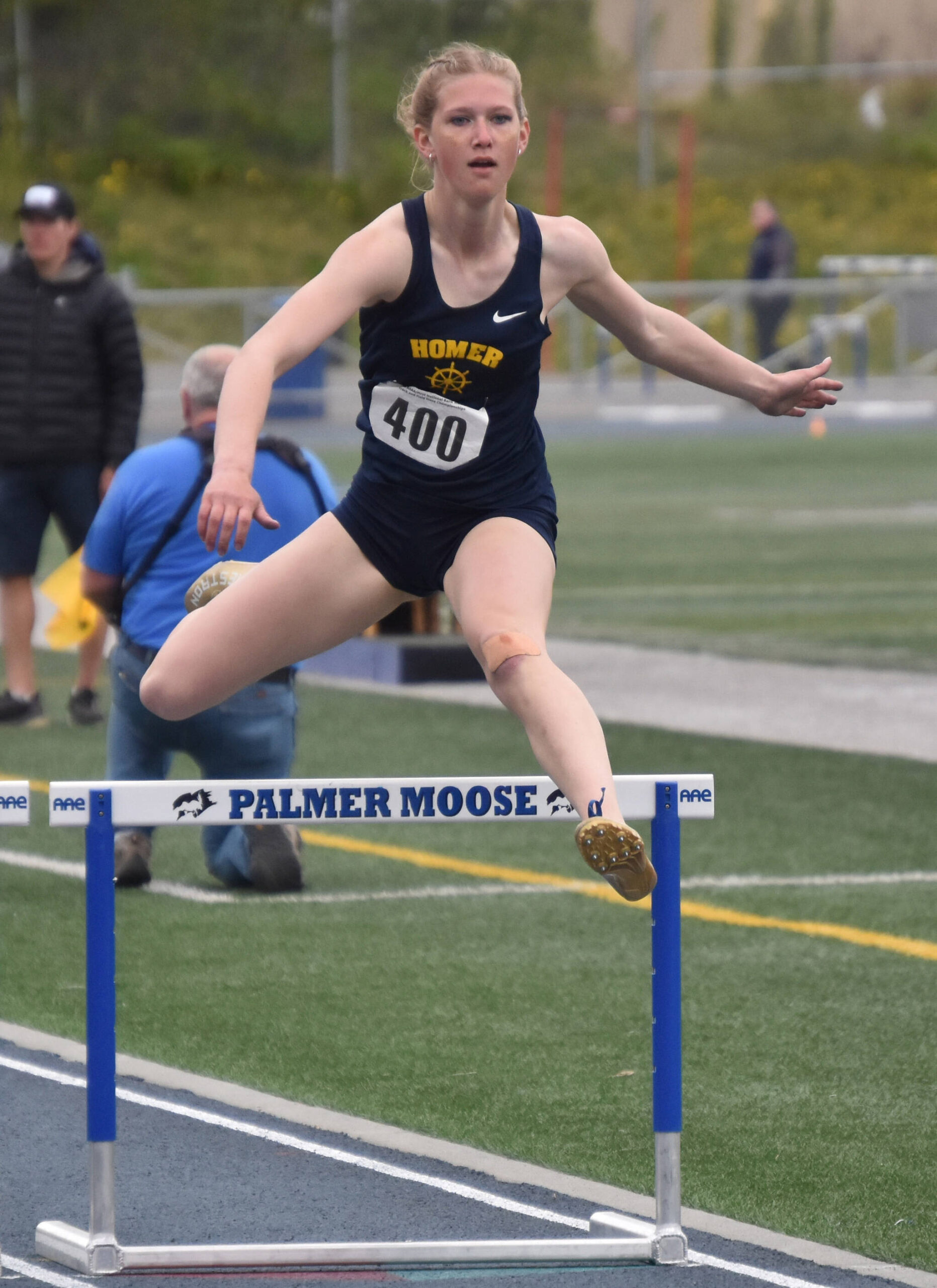 Homer’s Gracie Miotke wins the Division II 300-meter hurdles Saturday, May 27, 2023, at the state track and field meet at Palmer High School in Palmer, Alaska. (Photo by Jeff Helminiak/Peninsula Clarion)