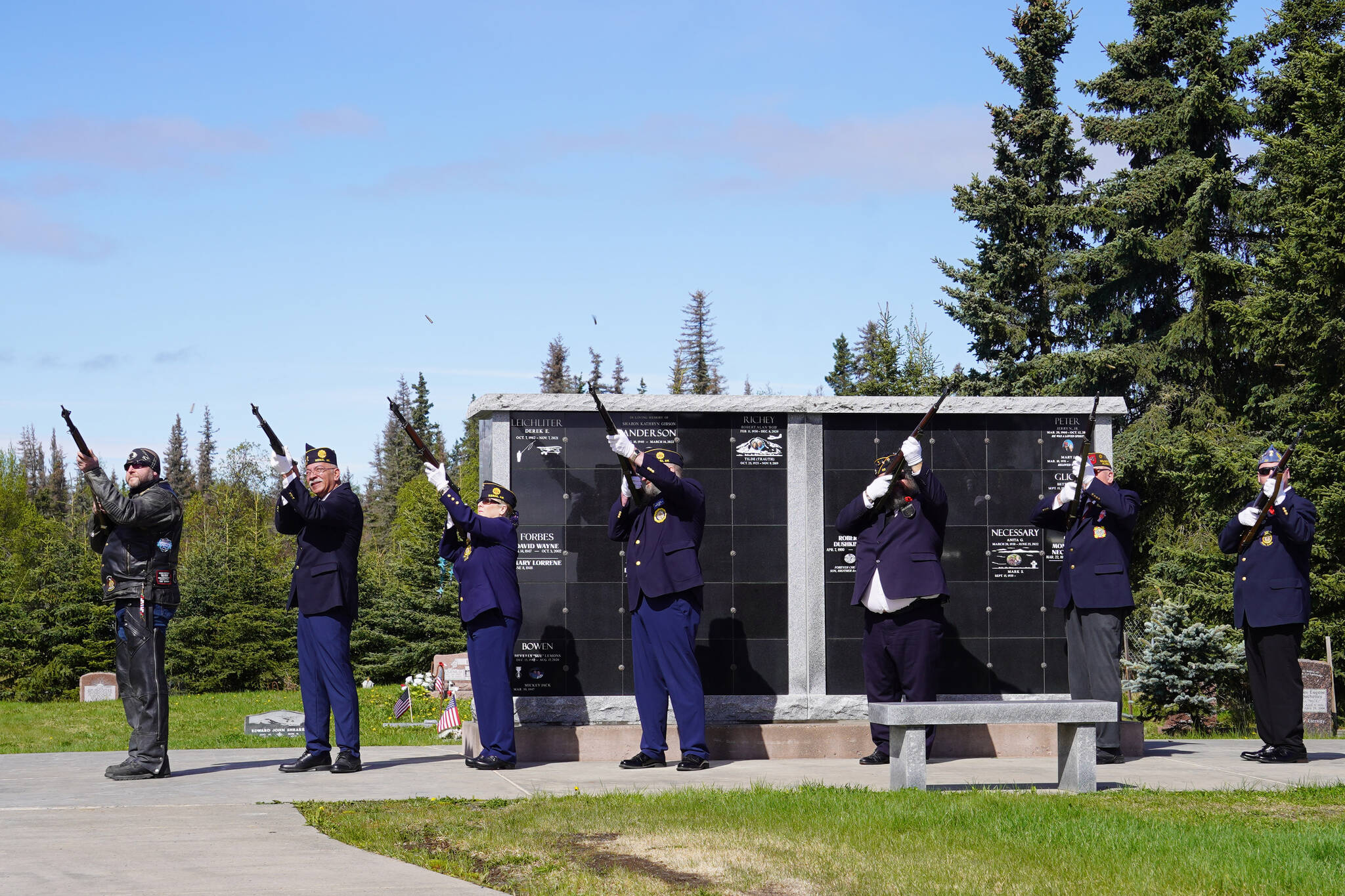 American Legion Post 20 members lead a salute during a Memorial Day ceremony on Monday, May 29, 2023, at the Kenai Cemetery in Kenai, Alaska. (Jake Dye/Peninsula Clarion)
