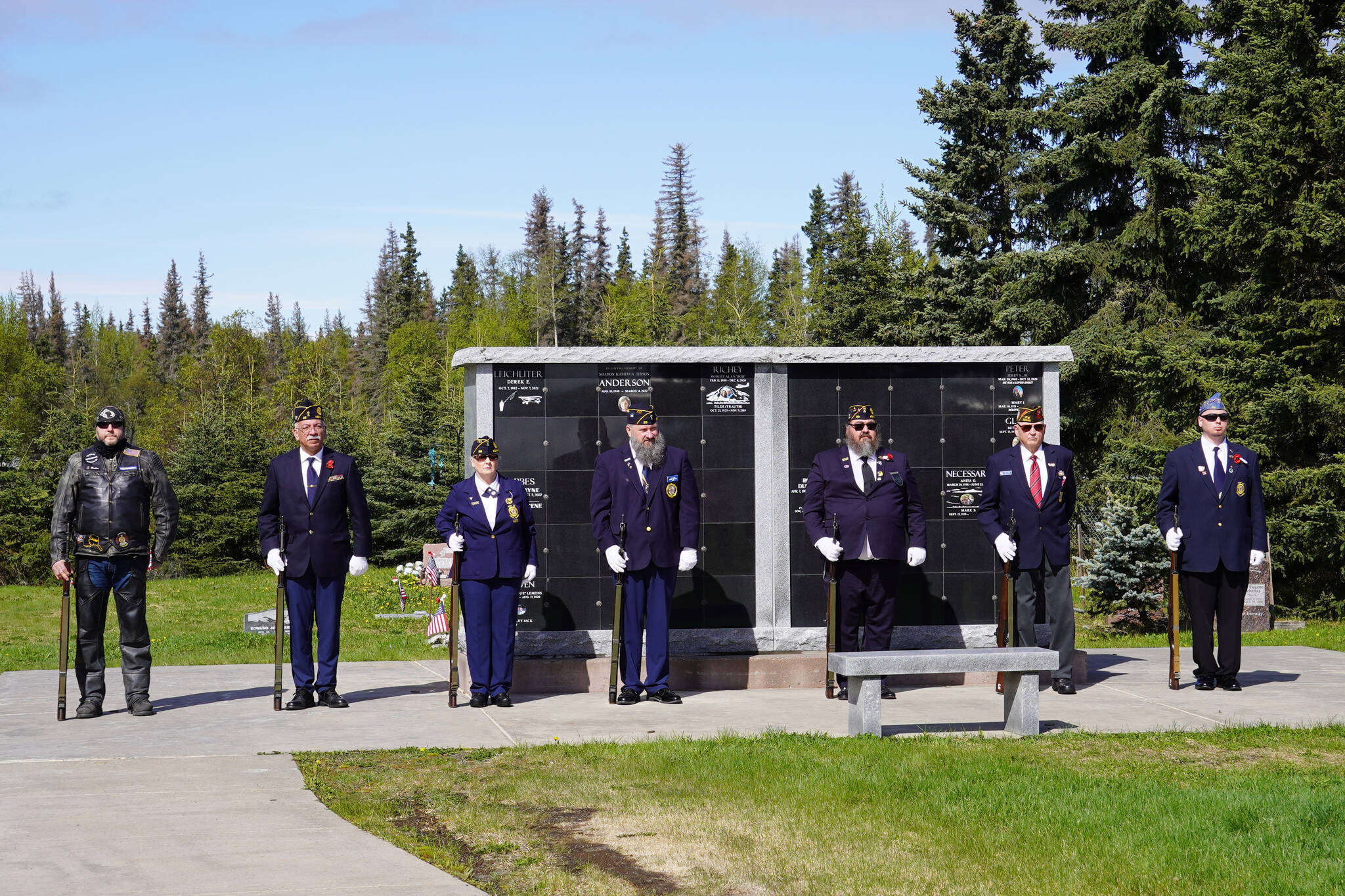 American Legion Post 20 members lead a salute during a Memorial Day ceremony on Monday, May 29, 2023, at the Kenai Cemetery in Kenai, Alaska. (Jake Dye/Peninsula Clarion)