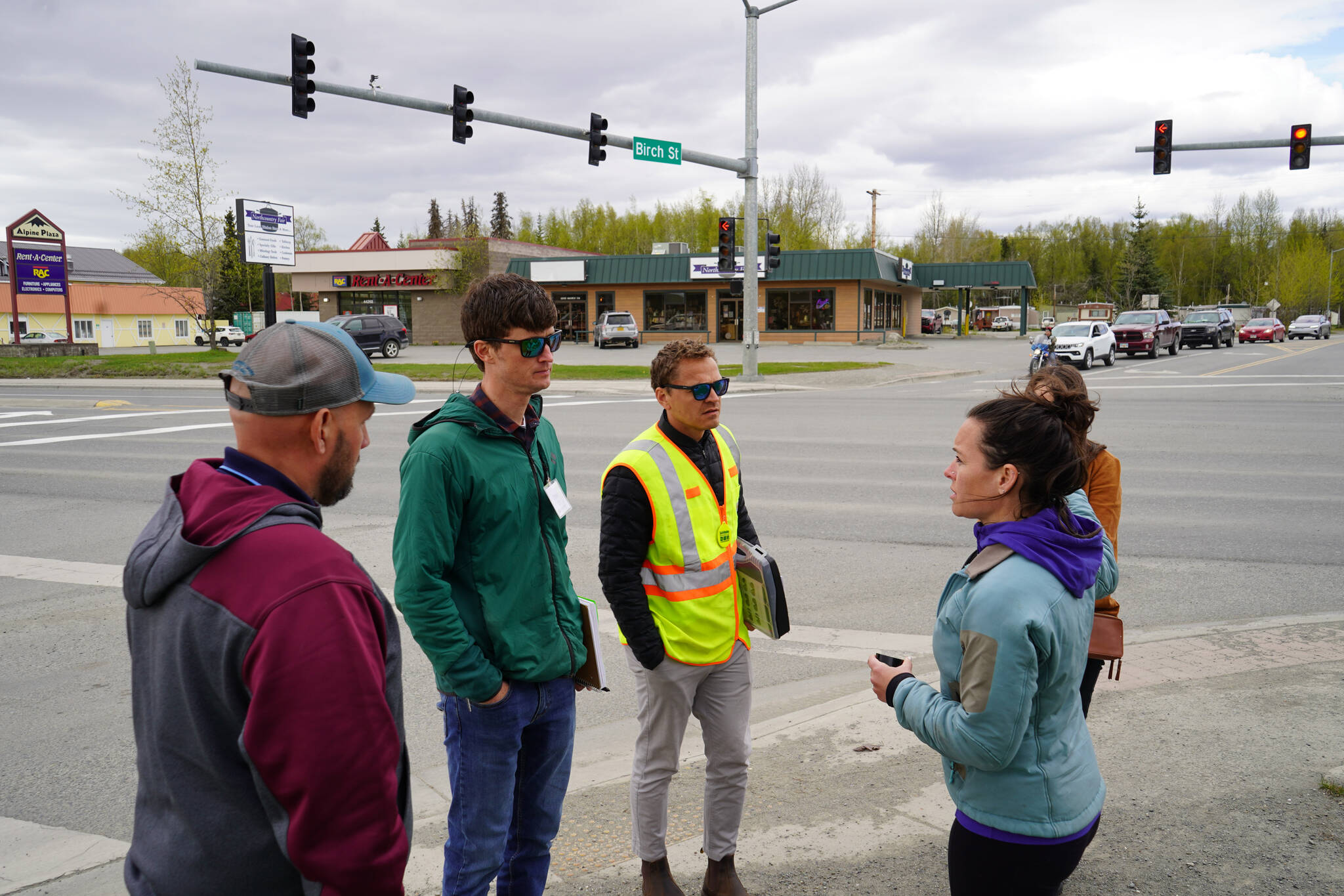 Transportation professionals discuss concerns and suggest solutions at the Sterling Highway and Birch Avenue intersection in Soldotna, Alaska, on Monday, May 22, 2023. (Jake Dye/Peninsula Clarion)