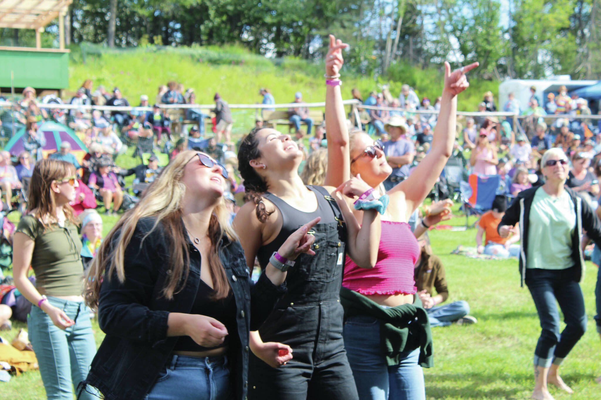 People gather in Ninilchik Aug. 5, 2022, for Salmonfest, an annual event that raises awareness about salmon-related causes. (Camille Botello/Peninsula Clarion)