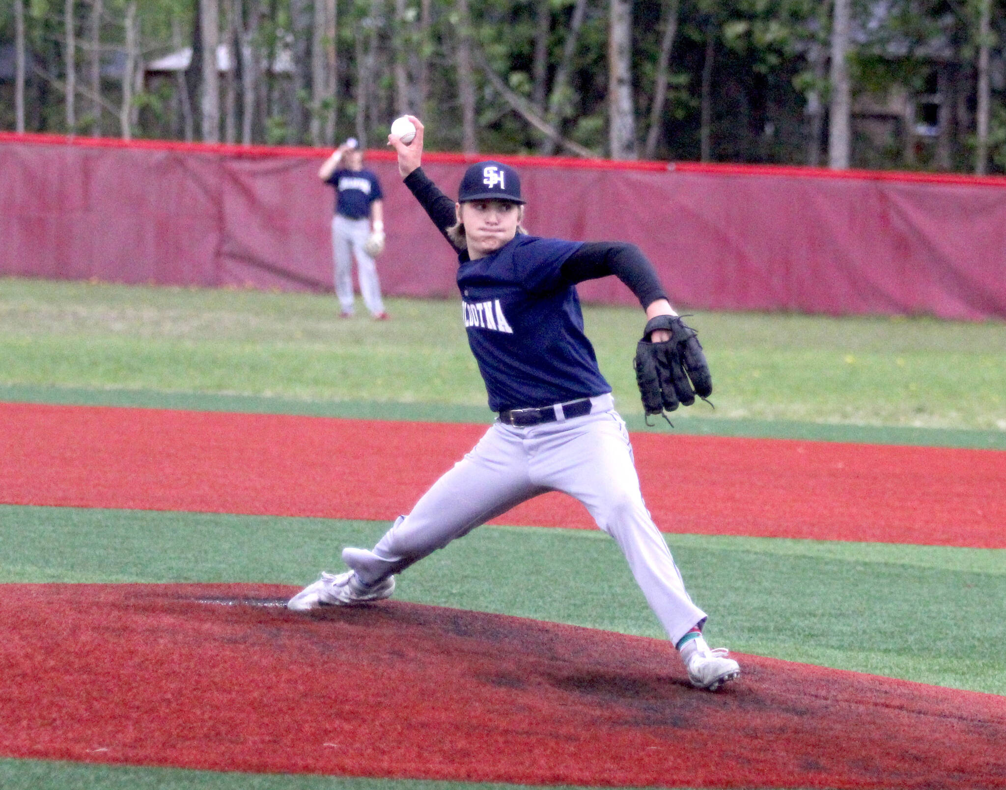 Soldotna’s Trenton Ohnemus fires a pitch against the Palmer Moose during the Division II state quarterfinal game Thursday, June 1, 2023, at Wasilla High School. (Jeremiah Bartz/Frontiersman)