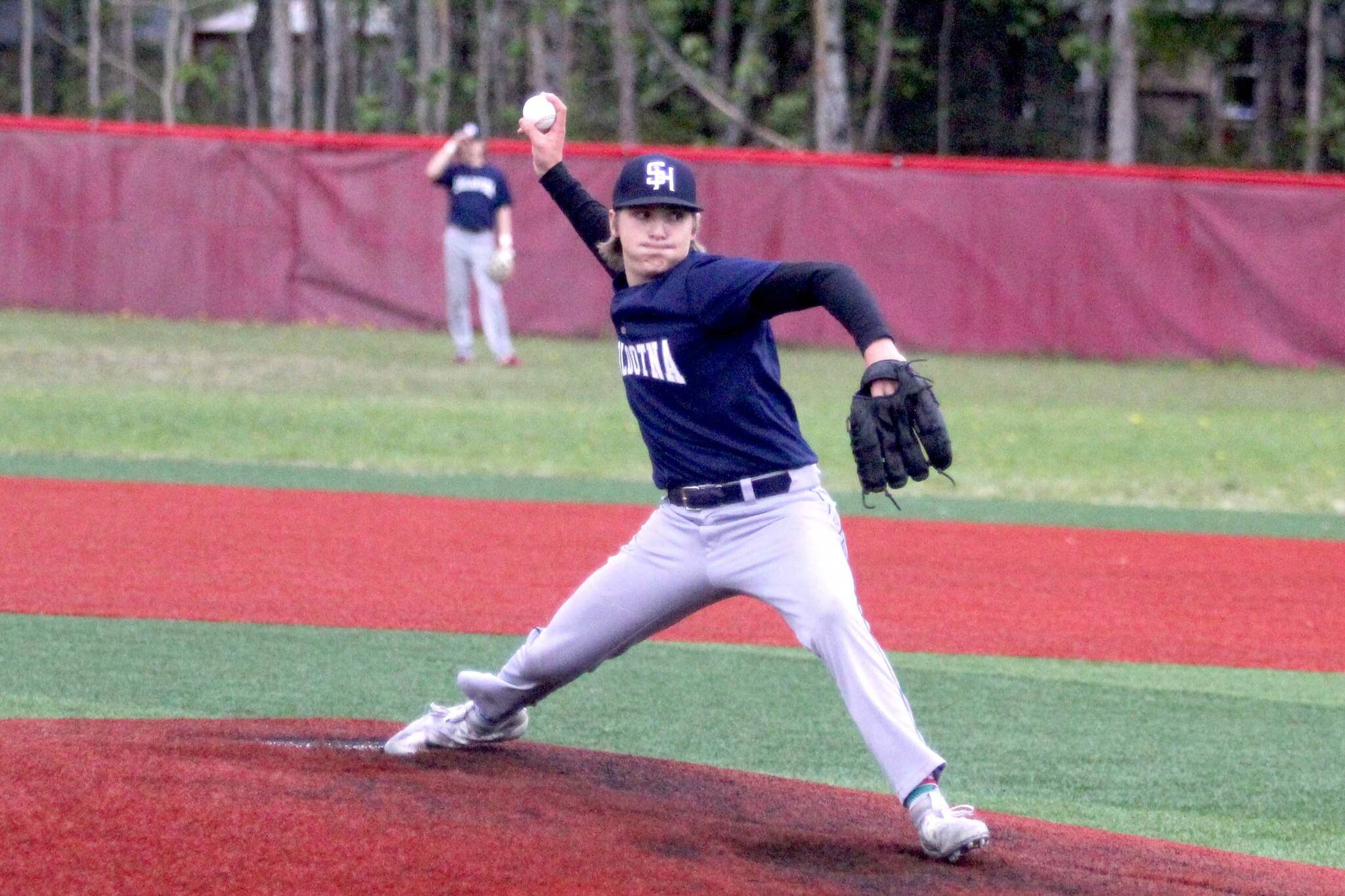 Soldotna's Trenton Ohnemus fires a pitch against the Palmer Moose during the Division II state quarterfinal game Thursday, June 1, 2023, at Wasilla High School. (Jeremiah Bartz/Frontiersman)