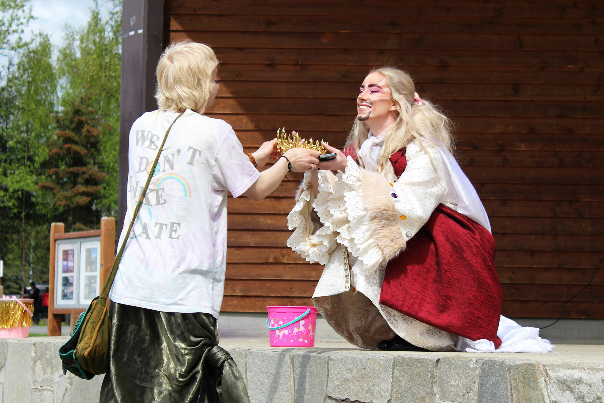 Drag performer Jasper Dragful accepts a crown after speaking about the history of drag during Soldotna Pride in the Park on Saturday, June 3, 2023 in Soldotna, Alaska. (Ashlyn O’Hara/Peninsula Clarion)