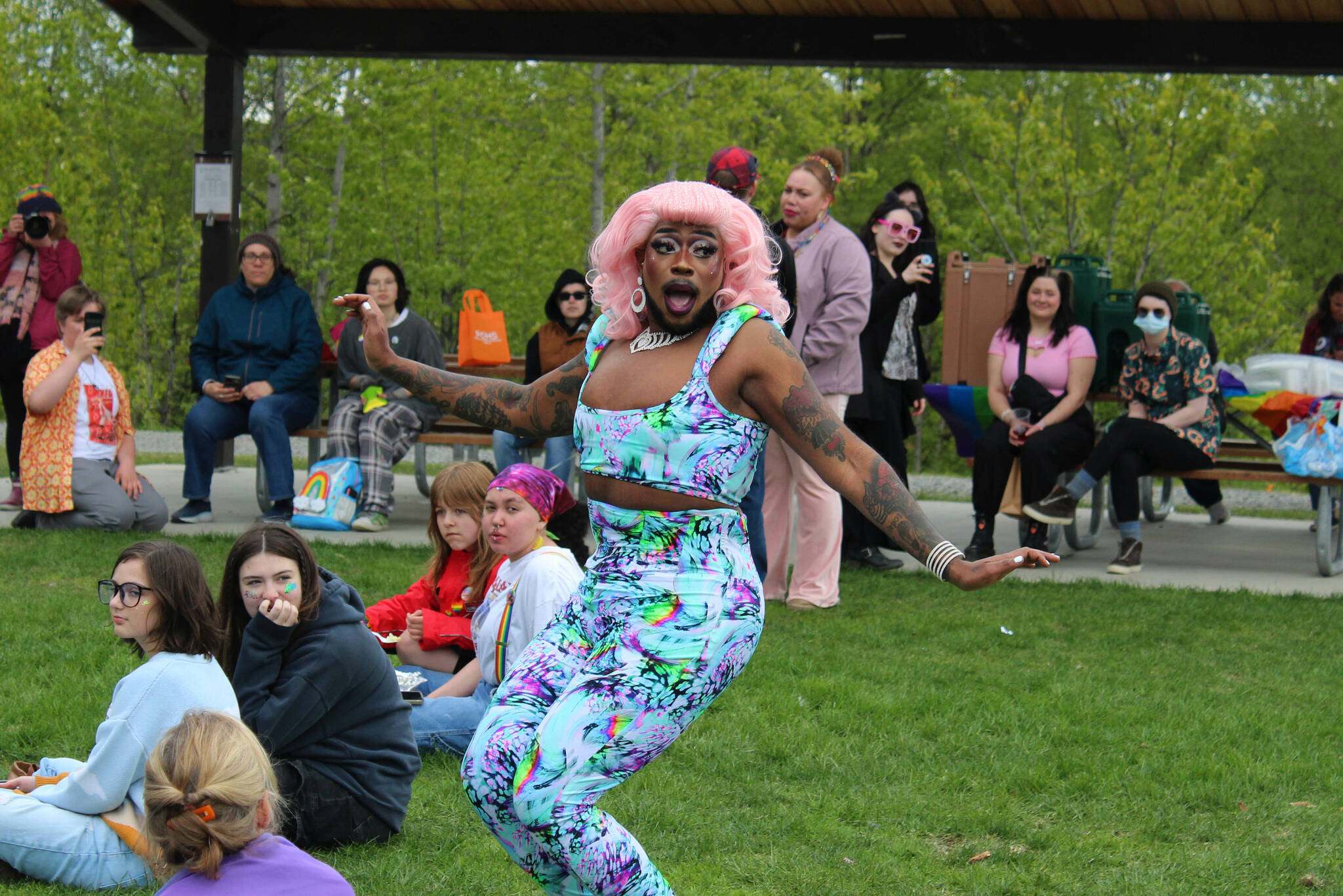 Drag queen Athena Nuff walks through the crowd during a performance at Soldotna Creek Park on Saturday, June 3, 2023 in Soldotna, Alaska. (Ashlyn O’Hara/Peninsula Clarion)