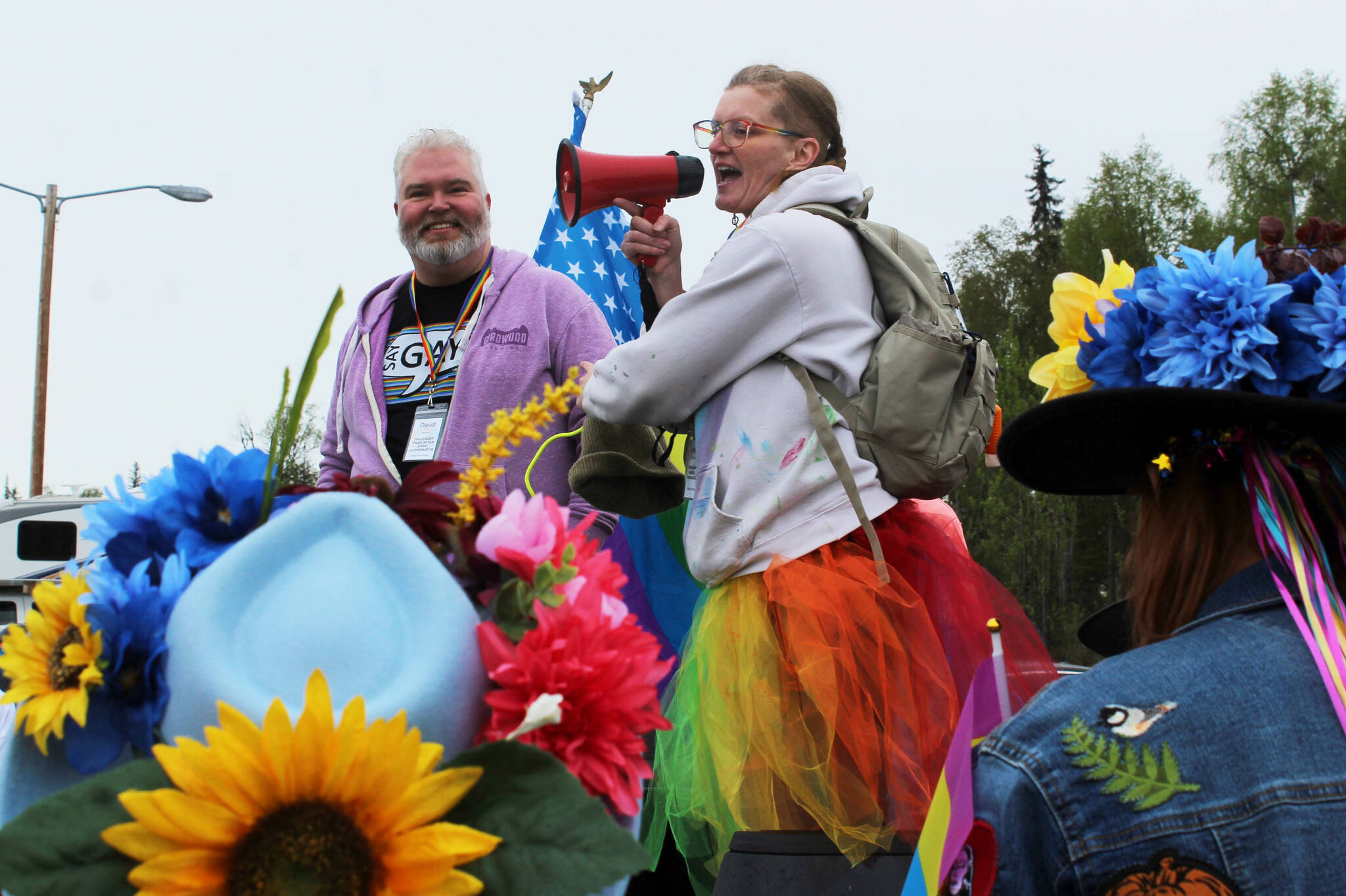 David Brighton (left) and Leslie Byrd (right) prepare to lead marchers from the Soldotna Regional Sports Complex to Soldotna Creek Park as part of Soldotna Pride in the Park on Saturday, June 3, 2023 in Soldotna, Alaska. (Ashlyn O’Hara/Peninsula Clarion)