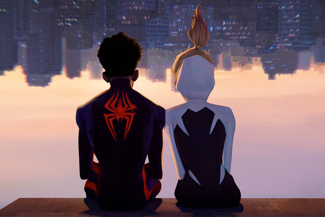 Shameik Moore’s Miles Morales, Spider-Man, and Hailee Steinfeld’s Gwen Stacy, Spider-Woman, share a quiet moment and look out over the Brooklyn skyline in “Spider-Man: Across the Spider-Verse.” (Promotional image courtesy Sony Pictures)