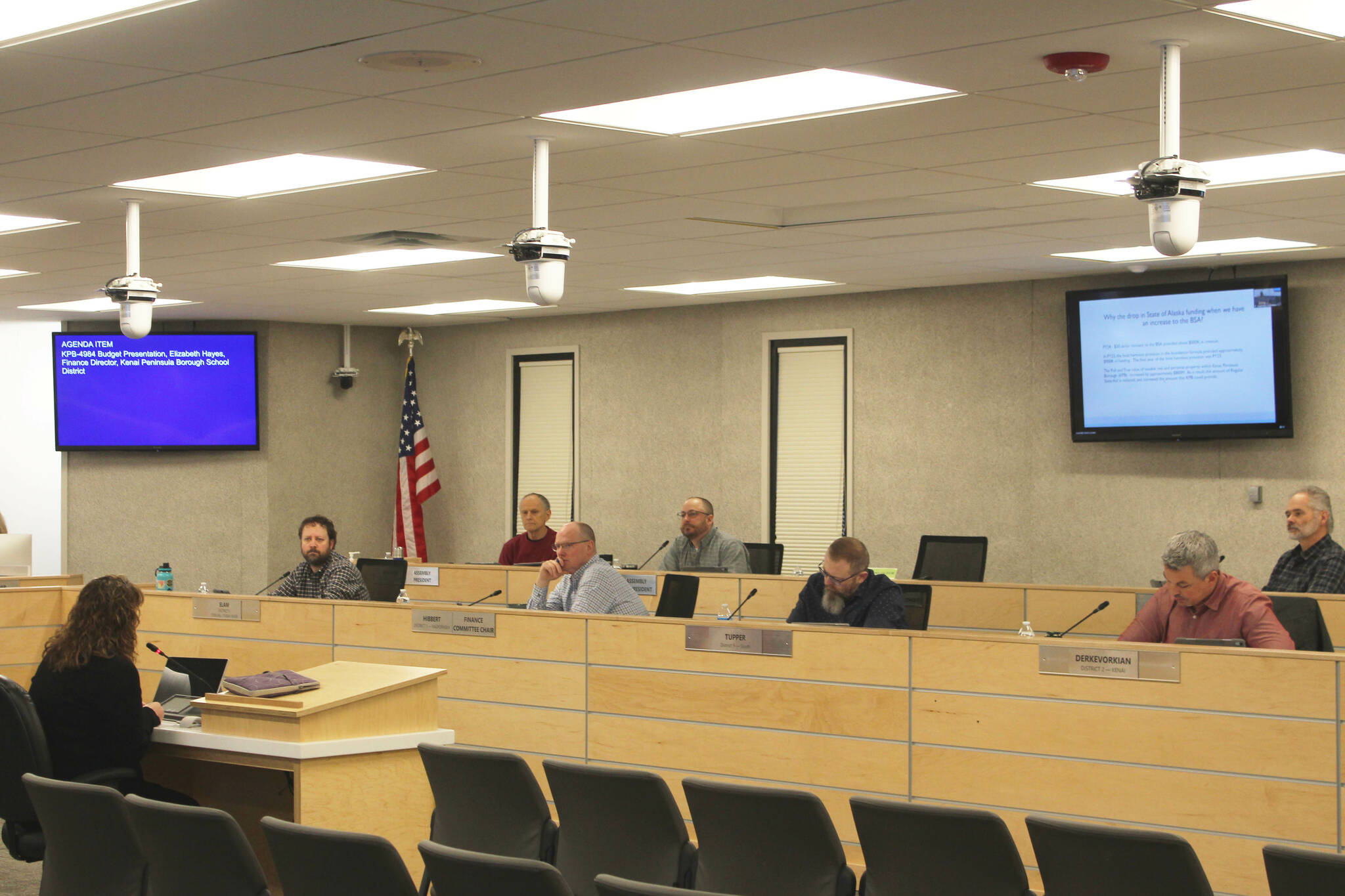 Kenai Peninsula Borough School District Finance Director Liz Hayes, left, testifies before the Kenai Peninsula Borough Assembly during a budget work session on Tuesday, March 14, 2023, in Soldotna, Alaska. (Ashlyn O’Hara/Peninsula Clarion)