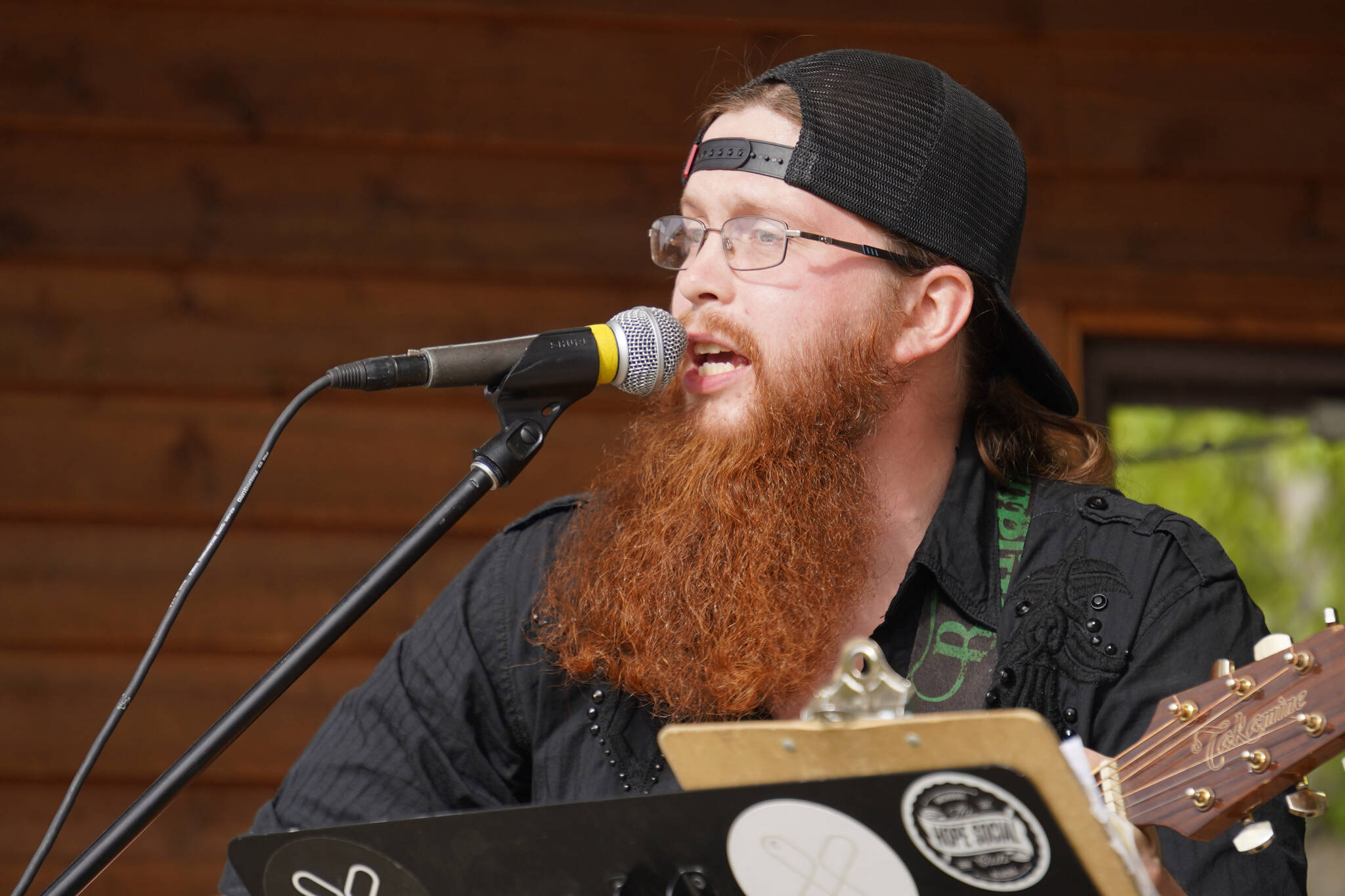 Ben Mattox performs as part of BenJammin & The Jammin Band during the Levitt AMP Soldotna Music Series on Wednesday, June 7, 2023, at Soldotna Creek Park in Soldotna, Alaska. (Jake Dye/Peninsula Clarion)