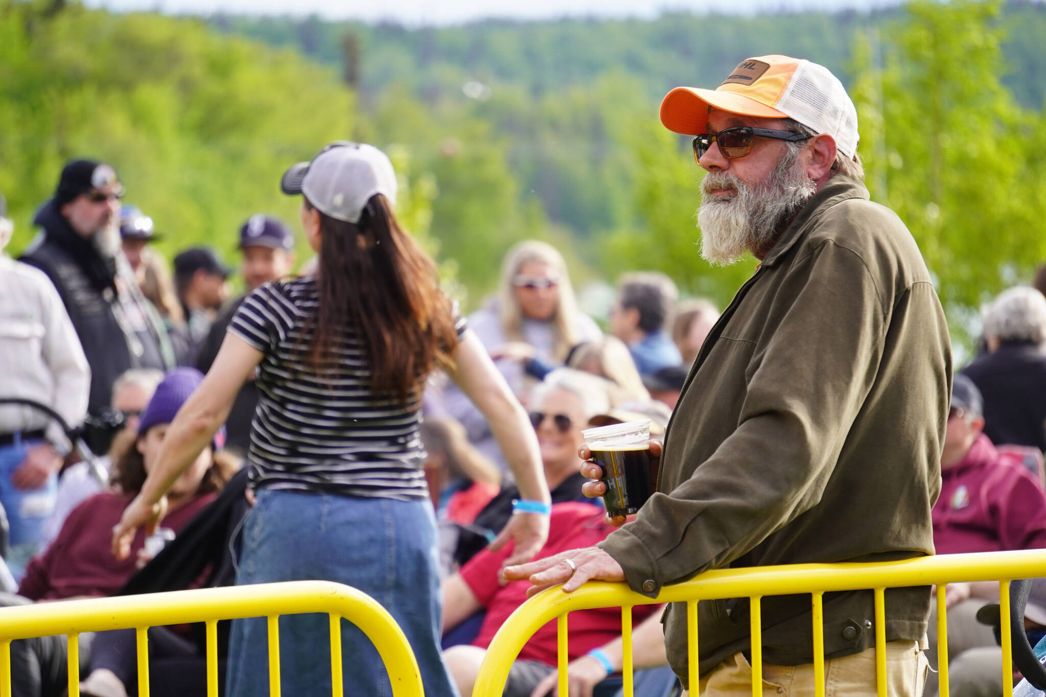 Attendees gather to listen to Blackwater Railroad Company during the Levitt AMP Soldotna Music Series on Wednesday, June 7, 2023, at Soldotna Creek Park in Soldotna, Alaska. (Jake Dye/Peninsula Clarion)