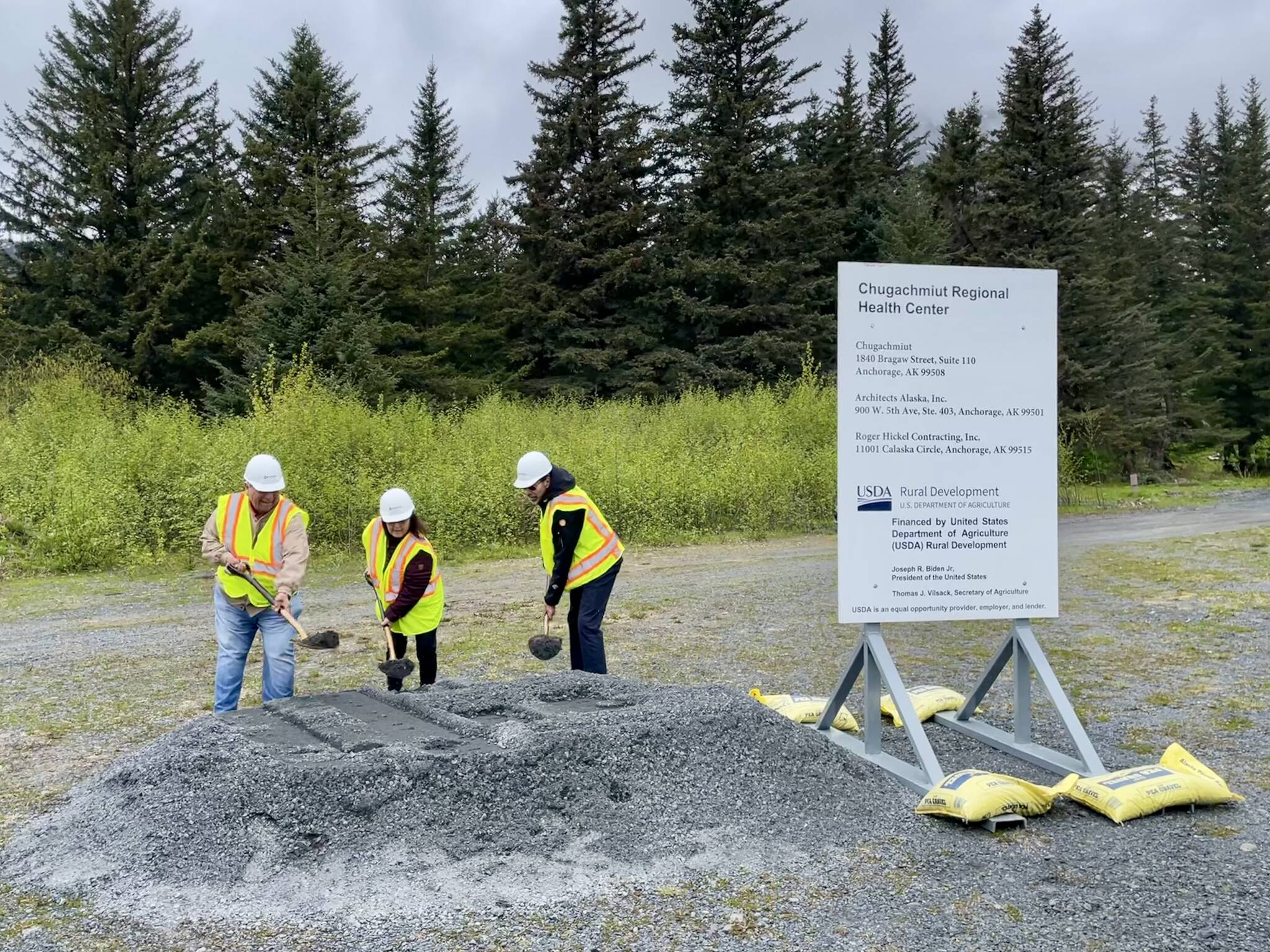 Chugachmiut Board Vice Chair Larry Evanoff from Chenega, Chair Fran Norman from Port Graham, and Director Arne Hatch from Qutekcak broke ground for the Chugachmiut Regional Health Center in Seward, Alaska, Saturday, June 3. The occasion marked the start of construction of the $20 million facility. The 15,475 square foot Tribally owned and operated health clinic will serve as a regional hub providing medical, dental, and behavioral health services for Alaskans in seven Tribal communities. (Photo provided by United States Department of Agriculture Rural Development)