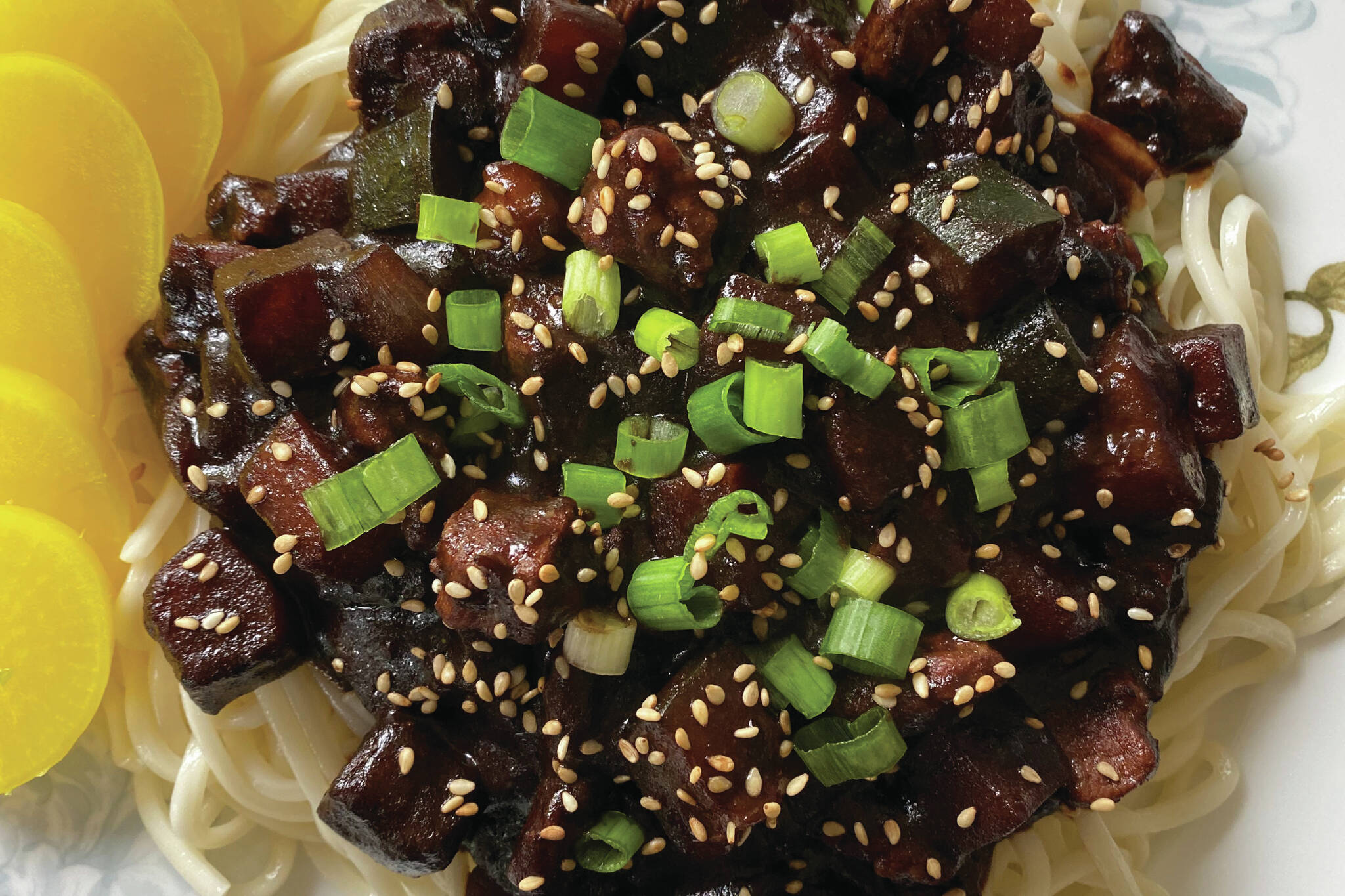 A favorite of Korean kids and college kids alike, Korean black bean noodles are an everyday takeout staple. (Photo by Tressa Dale/Peninsula Clarion)