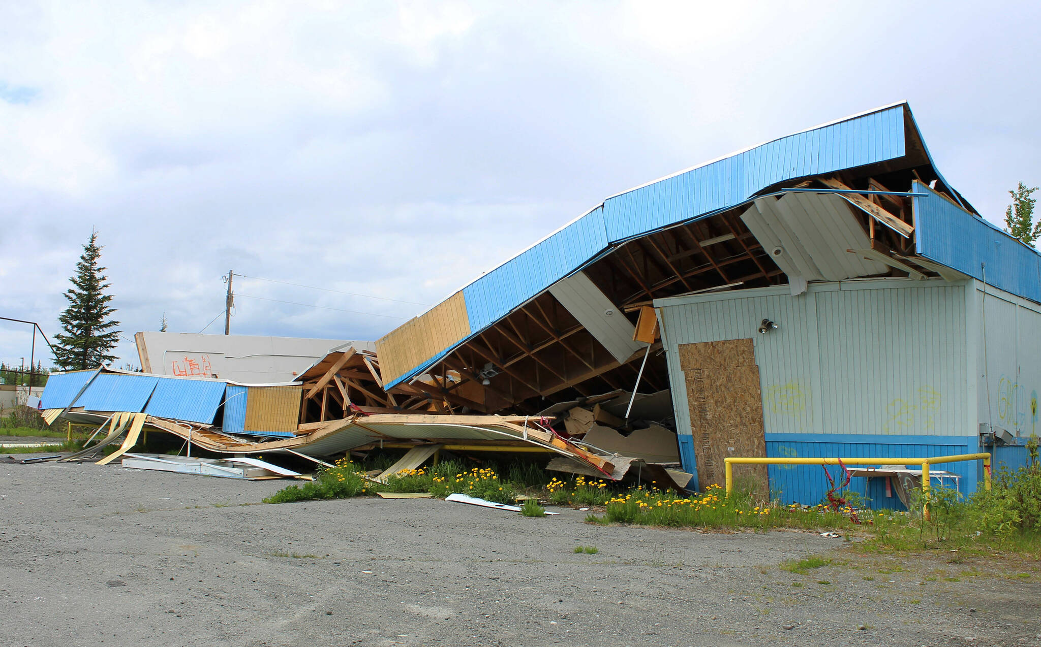Building materials pile up at the site of the former ZipMart on Wednesday, June 14, 2023, in Sterling, Alaska. (Ashlyn O’Hara/Peninsula Clarion)