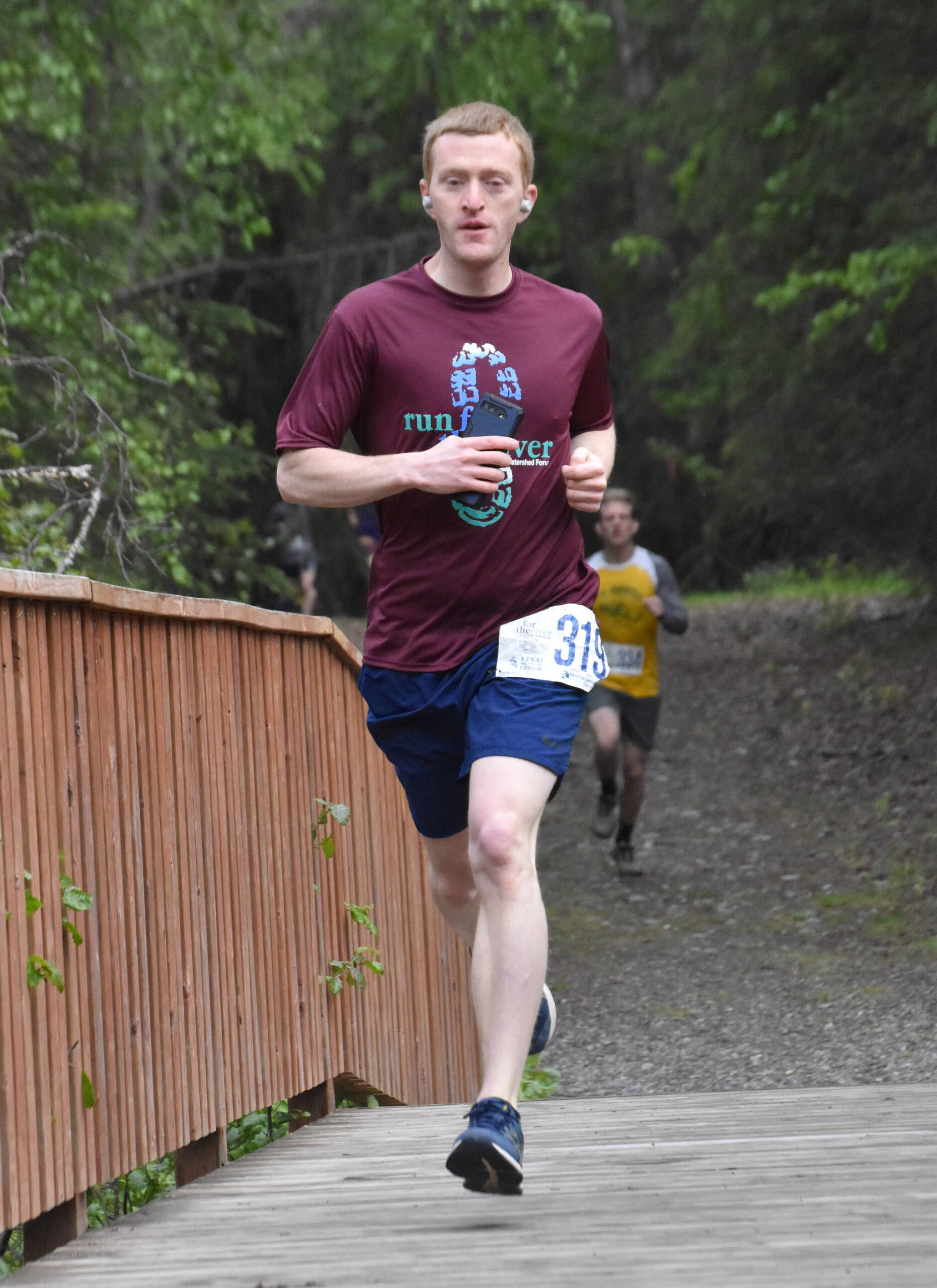 Anchorage’s Matt Auer runs to victory in the five-kilometer event at the Run for the River on Saturday, June 10, 2023, in Soldotna, Alaska. (Photo by Jeff Helminiak/Peninsula Clarion)