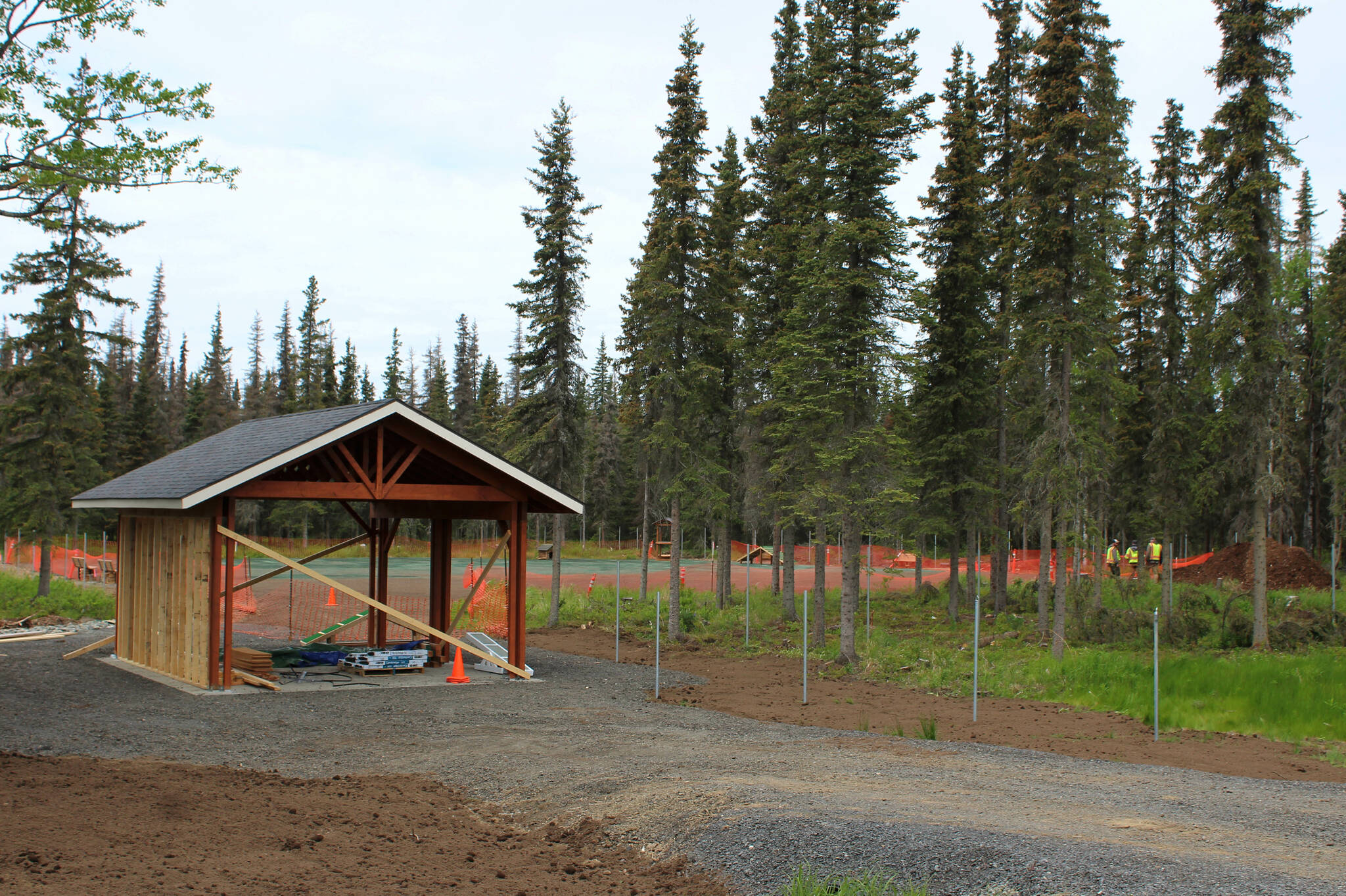 A pavillion under construction marks the entrance to the future Kenai Dog Park on Wednesday, June 14, 2023, in Kenai, Alaska. (Ashlyn O’Hara/Peninsula Clarion)