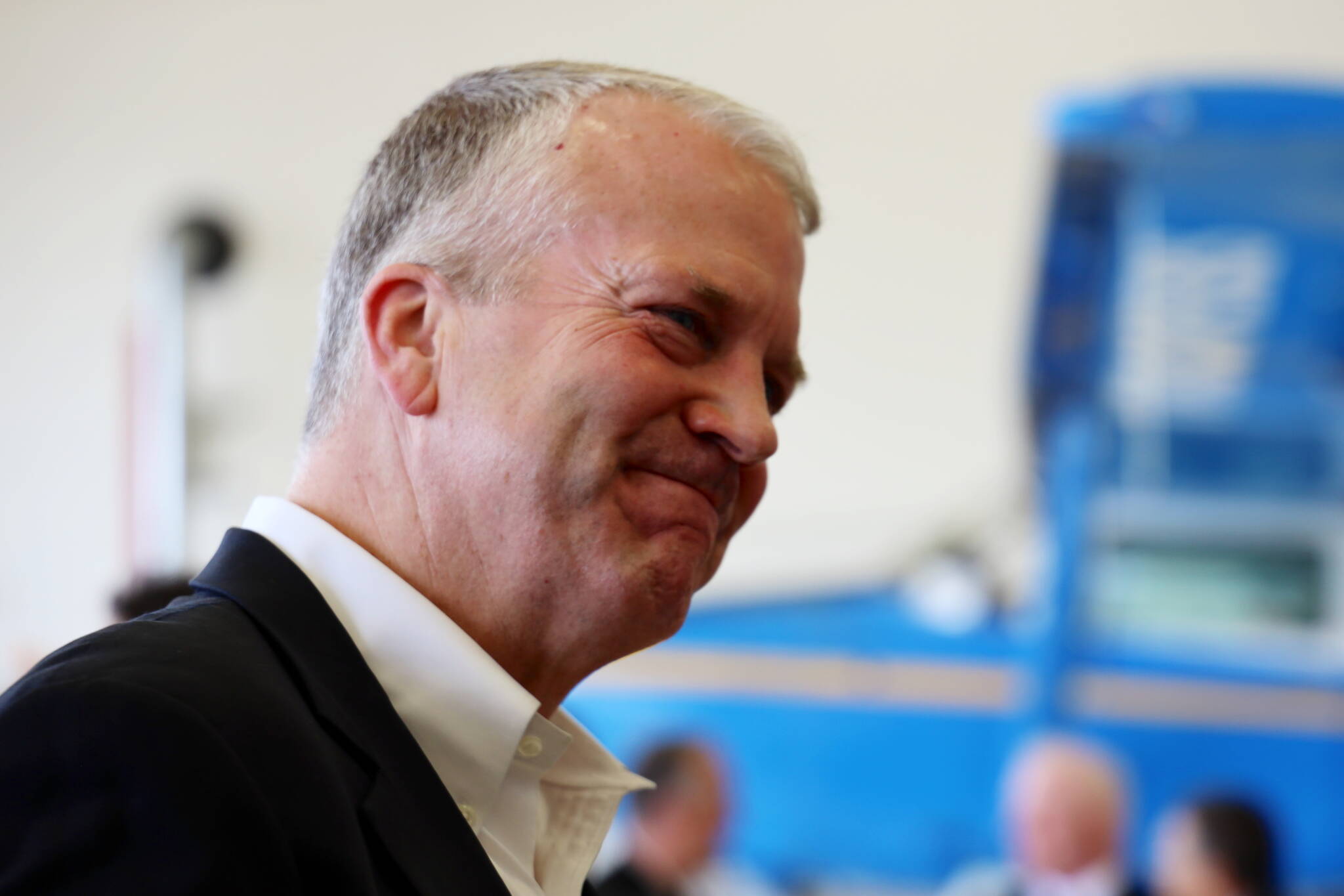 U.S. Sen. Dan Sullivan, R-Alaska, discusses the federal indictment of former President Donald Trump during a U.S. Coast Guard ceremony in Juneau on Friday, June 9. (Clarise Larson / Juneau Empire)