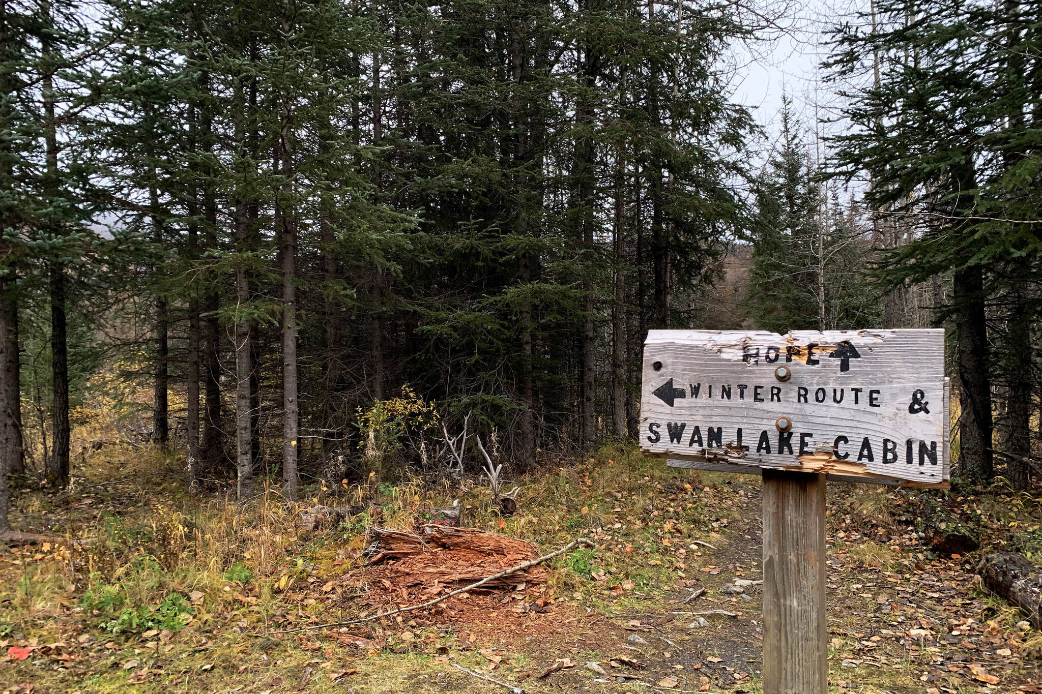 Signage points the way to the Swan Lake Cabin in the Chugach National Forest on Saturday, Oct. 1, 2022, near Cooper Landing, Alaska. (Ashlyn O’Hara/Peninsula Clarion)
