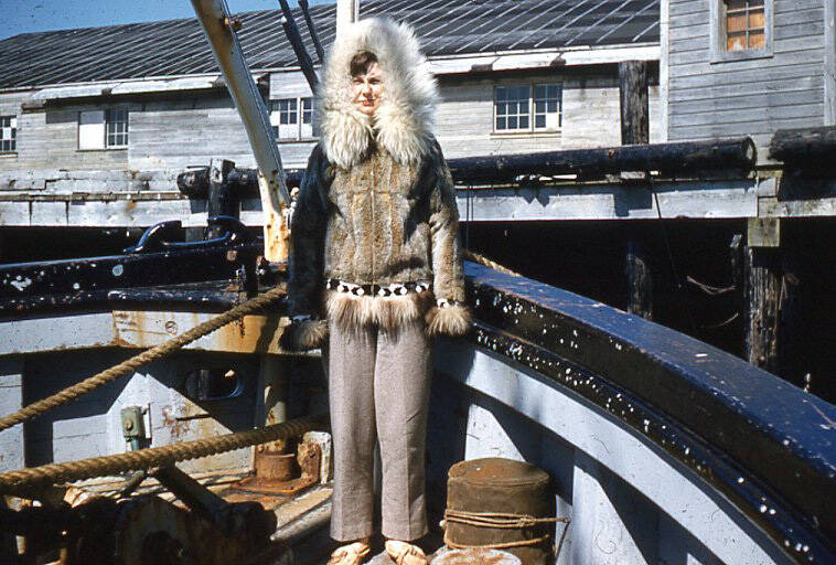 Photo courtesy of the Fenger Family Collection
Posing stiffly in the bow of the M.S. Hygiene, along the Alaska coast, is Nurse Grace Heutink, clad in a warm fur parka.