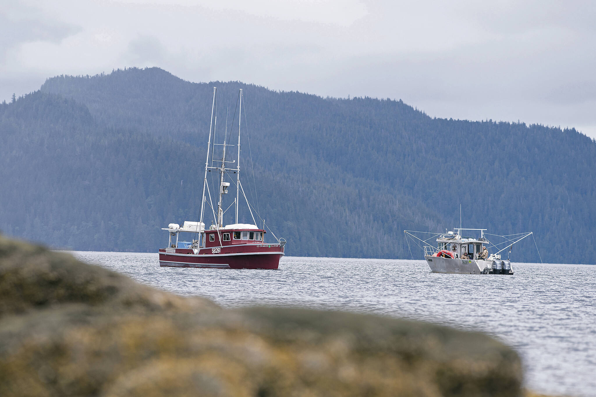Two commercial troll fishing boats pass each other on June 2, 2020, at Mountain Point in Ketchikan, Alaska. A U.S. appeals court on Wednesday, June 21, 2023, halted a lower court ruling that would have shut down southeast Alaska’s chinook salmon fishery for the summer to protect endangered orca whales that eat the fish. (Dustin Safranek/Ketchikan Daily News via AP, File)