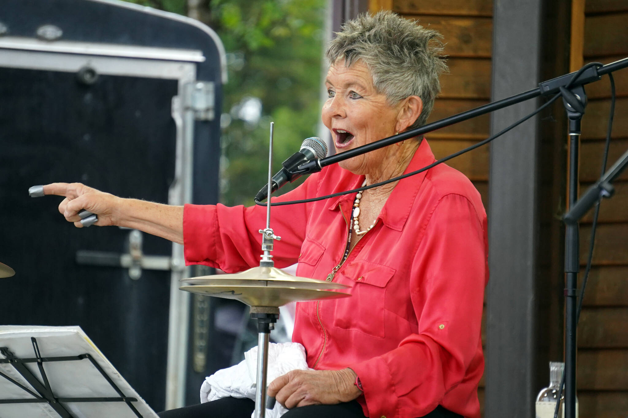 Connie Brannock, part of Connie Brannock’s Tiny House of Funk, performs during the Soldotna Music Series at Soldotna Creek Park in Soldotna, Alaska, on Wednesday, June 21, 2023. (Jake Dye/Peninsula Clarion)