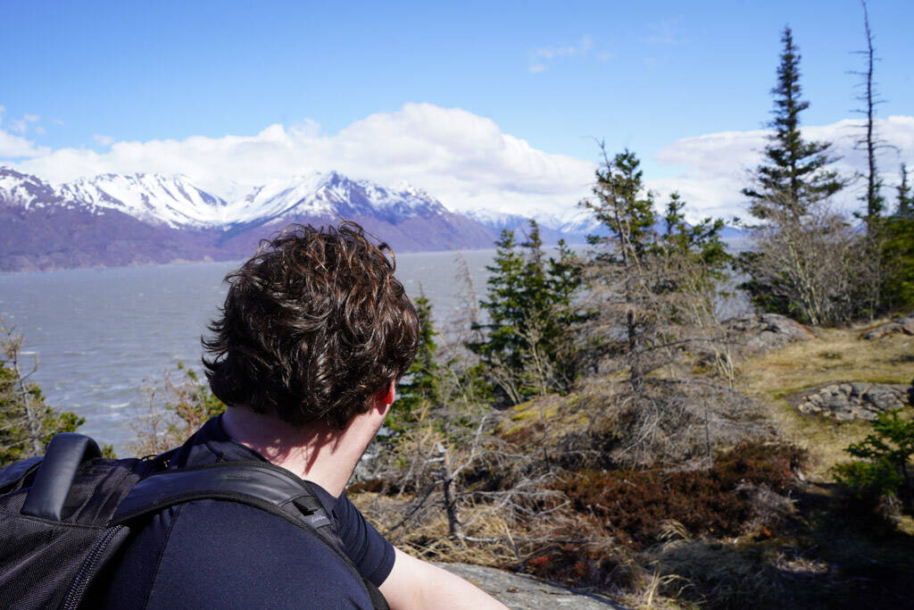 Jake Dye looks out from the top of Gull Rock in Hope, Alaska, on Saturday, May 13, 2023. He does not yet know that the hike back is far more challenging than the hike out. (Photo courtesy Ashley Every)