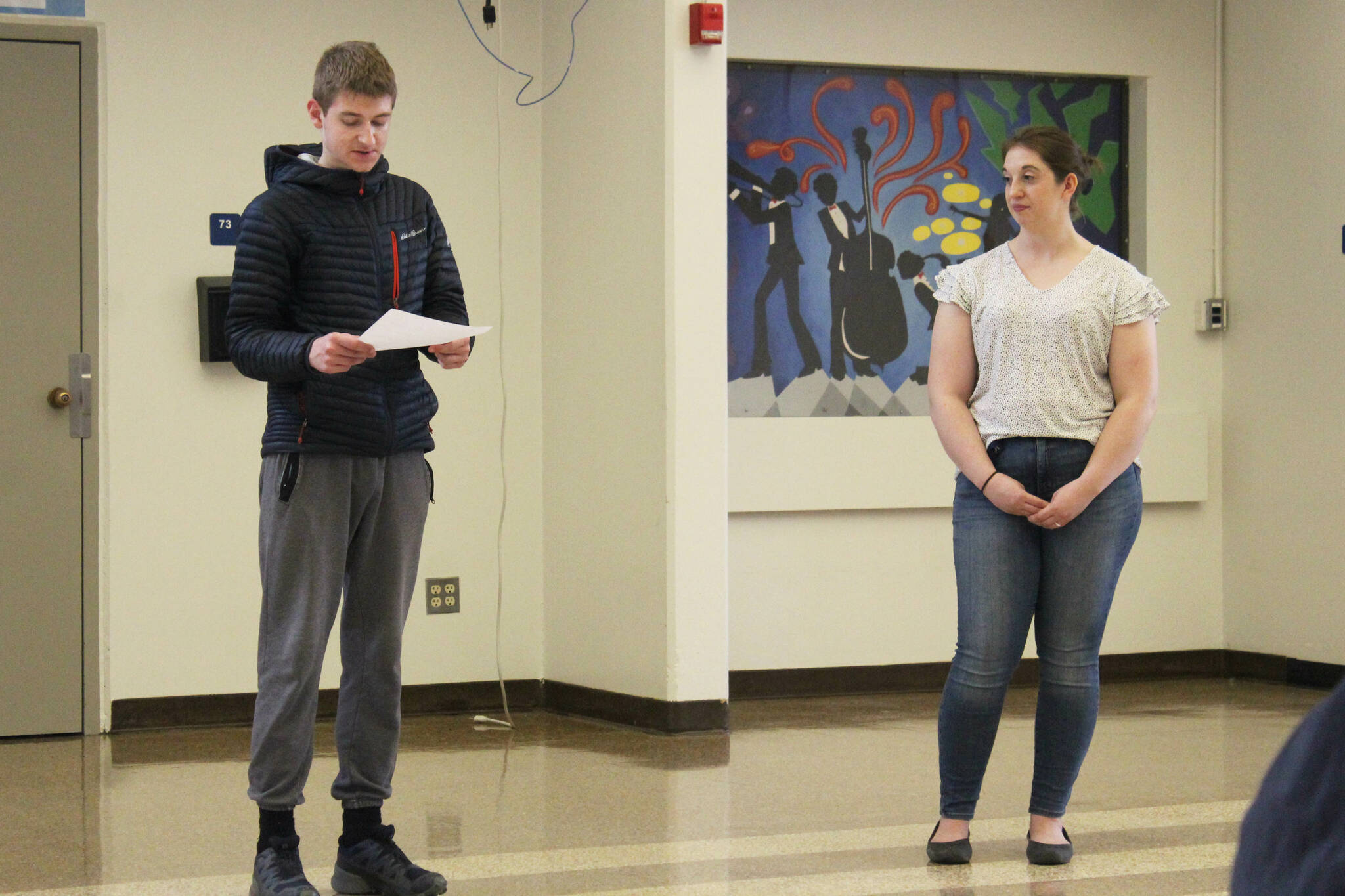 Boden White (left) talks to attendees about his experience participating in KPBSD’s Summer Work Program during a program celebration at Soldotna High School on Thursday, June 29, 2023 in Soldotna, Alaska. (Ashlyn O’Hara/Peninsula Clarion)