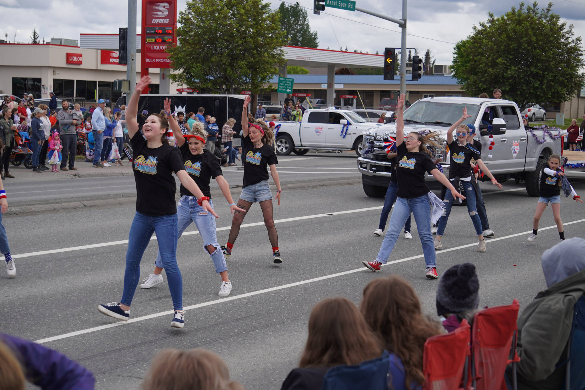 Diamond Dance Project students perform a routine as the Fourth of July Parade moves down the Kenai Spur Highway in Kenai, Alaska on Tuesday, July 4, 2023. (Jake Dye/Peninsula Clarion)