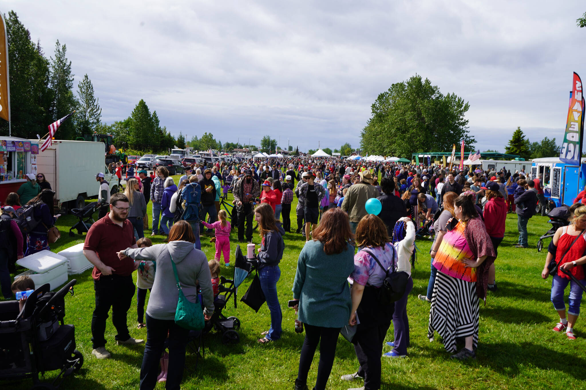 Countless attendees fill the softball greenstrip in Kenai, Alaska, during Fourth of July festivities on Tuesday, July 4, 2023. (Jake Dye/Peninsula Clarion)