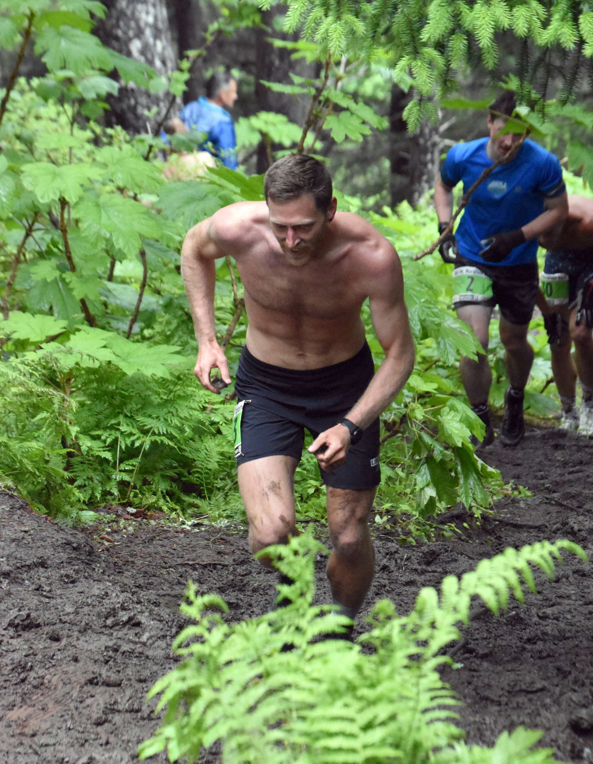 Anchorage’s Lars Arneson, a 2009 graduate of Cook Inlet Academy, competes in the men’s Mount Marathon Race on Tuesday, July 4, 2023, in Seward, Alaska. (Photo by Jeff Helminiak/Peninsula Clarion)