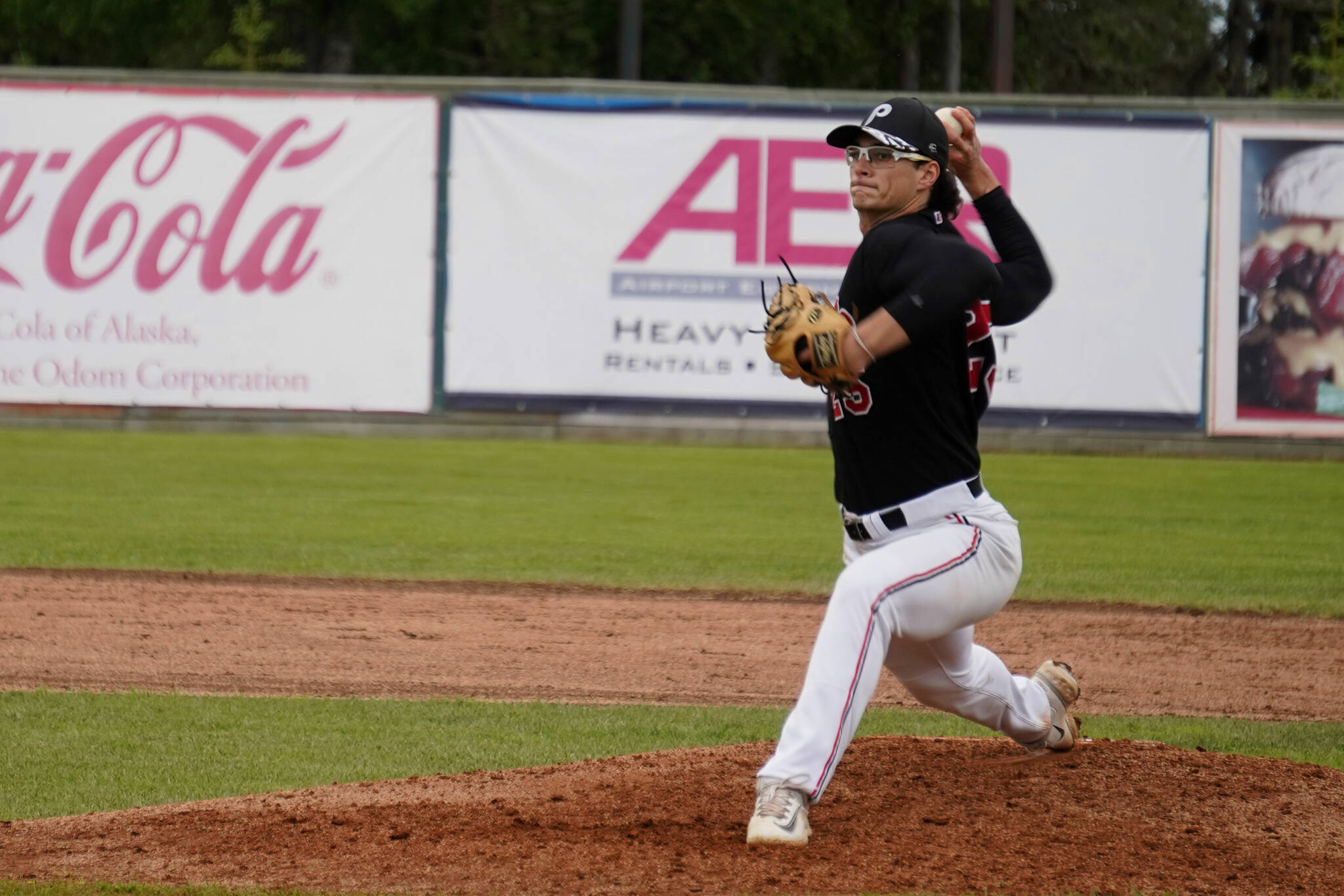 Ryan Brown throws a pitch during a game between the Peninsula Oilers and the Mat-Su Miners on Tuesday, July 4, 2023, at Coral Seymour Memorial Park in Kenai, Alaska. (Jake Dye/Peninsula Clarion)