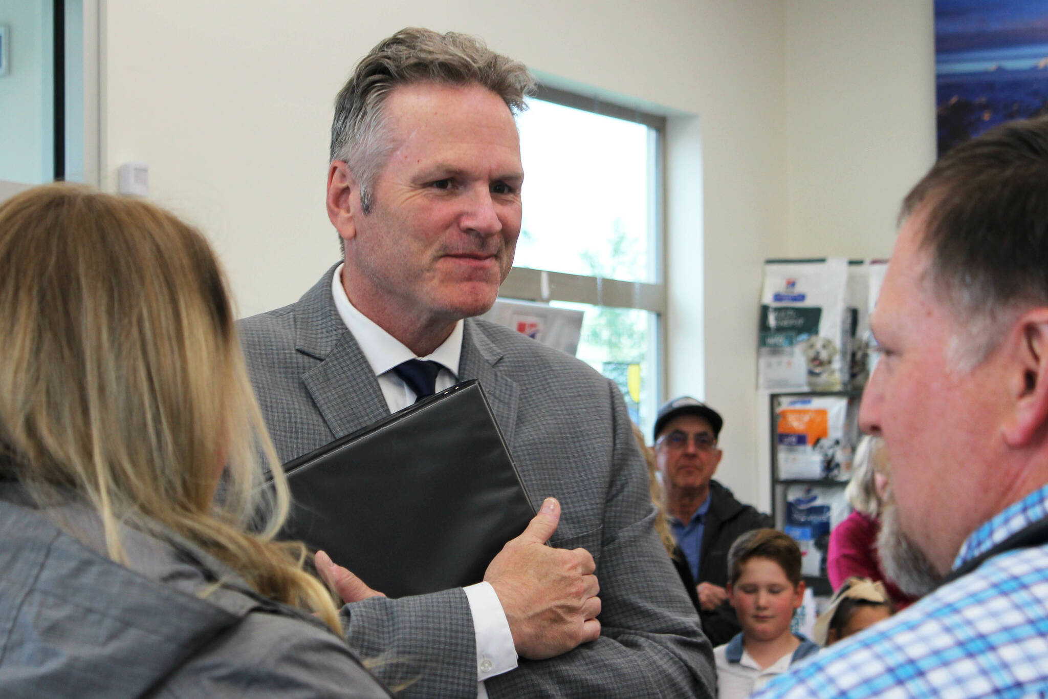 Gov. Mike Dunleavy prepares to deliver opening remarks at a bill signing event at Twin Cities Veterinary Clinic on Thursday, July 6, 2023 in Soldotna, Alaska. (Ashlyn O’Hara/Peninsula Clarion)