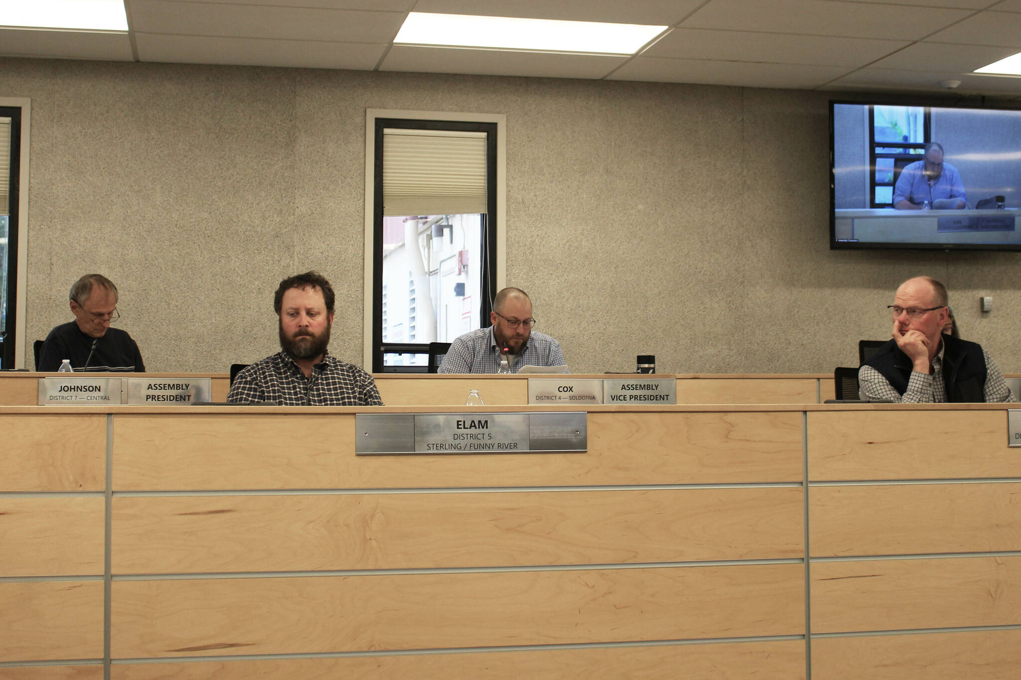 From left, Kenai Peninsula Borough Assembly members Brent Johnson, Bill Elam, Tyson Cox and Brent Hibebrt participate in a meeting on Tuesday, July 11, 2023 in Soldotna, Alaska. All assembly members pictured voted in favor of a resolution that supporting the separation of transgender and cisgender girl student athetes. (Ashlyn O’Hara/Peninsula Clarion)