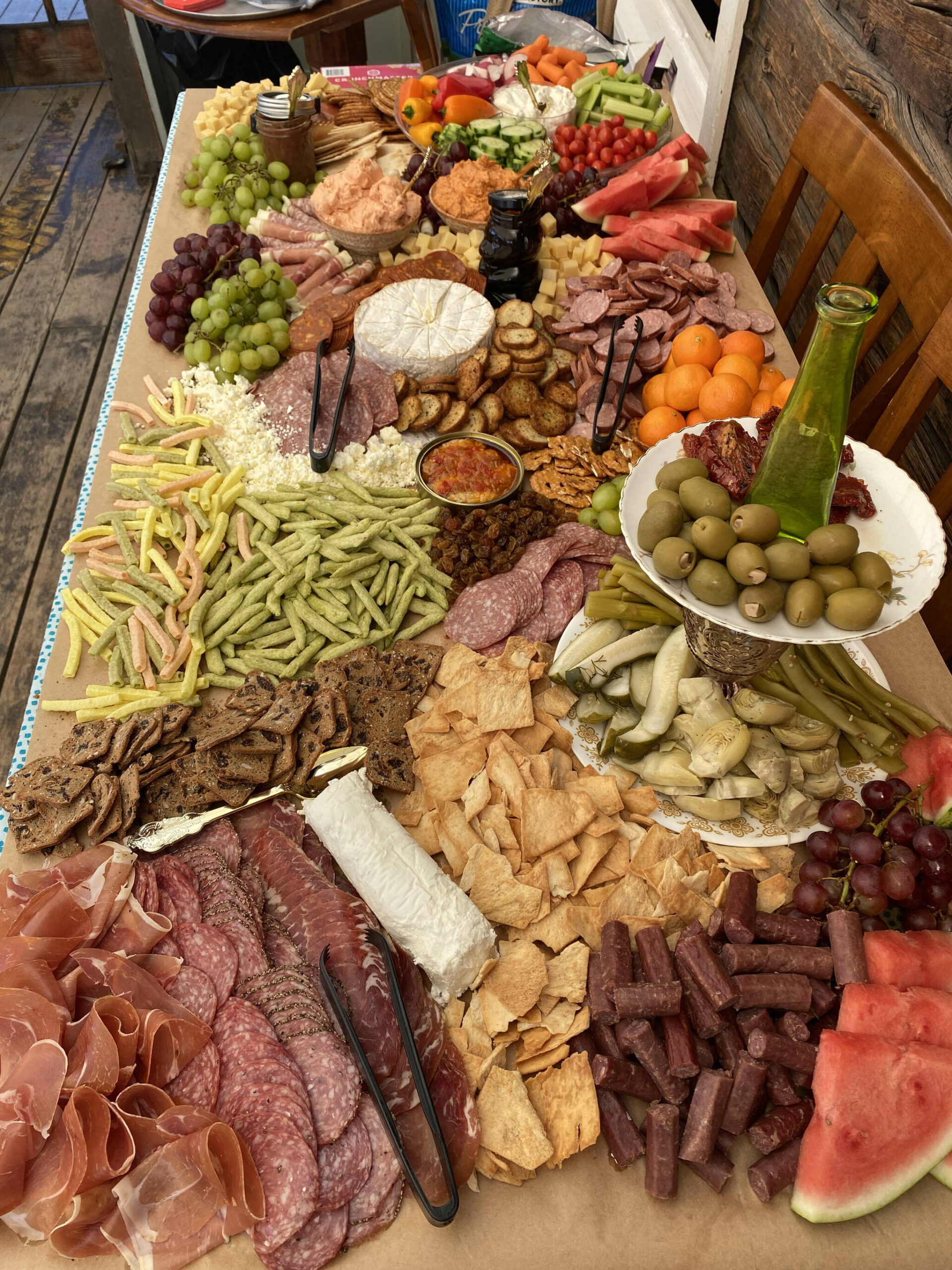 A grazing board, also known as a charcuterie board, is prepared Saturday, July 22, 2023, in Kenai, Alaska. (Photo by Tressa Dale/Peninsula Clarion)