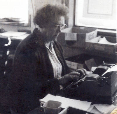 Cheechako News photo
Mable Smith pecks away at her typewriter in the Cheechako News office in Ridgeway, circa mid-1960s.